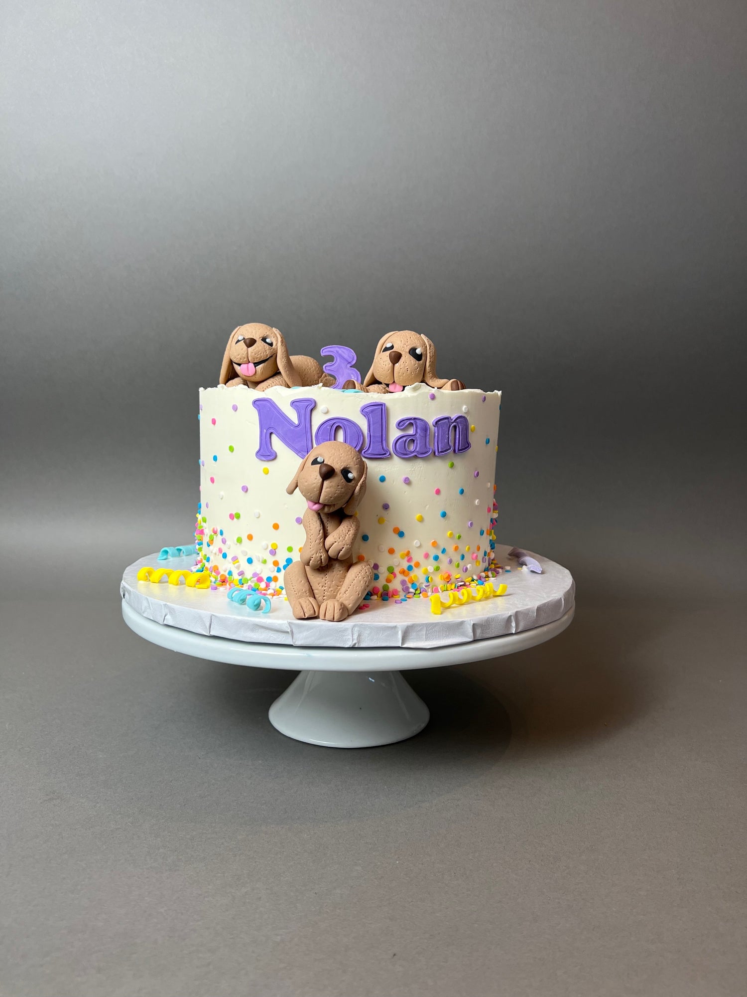 puppies on a cake