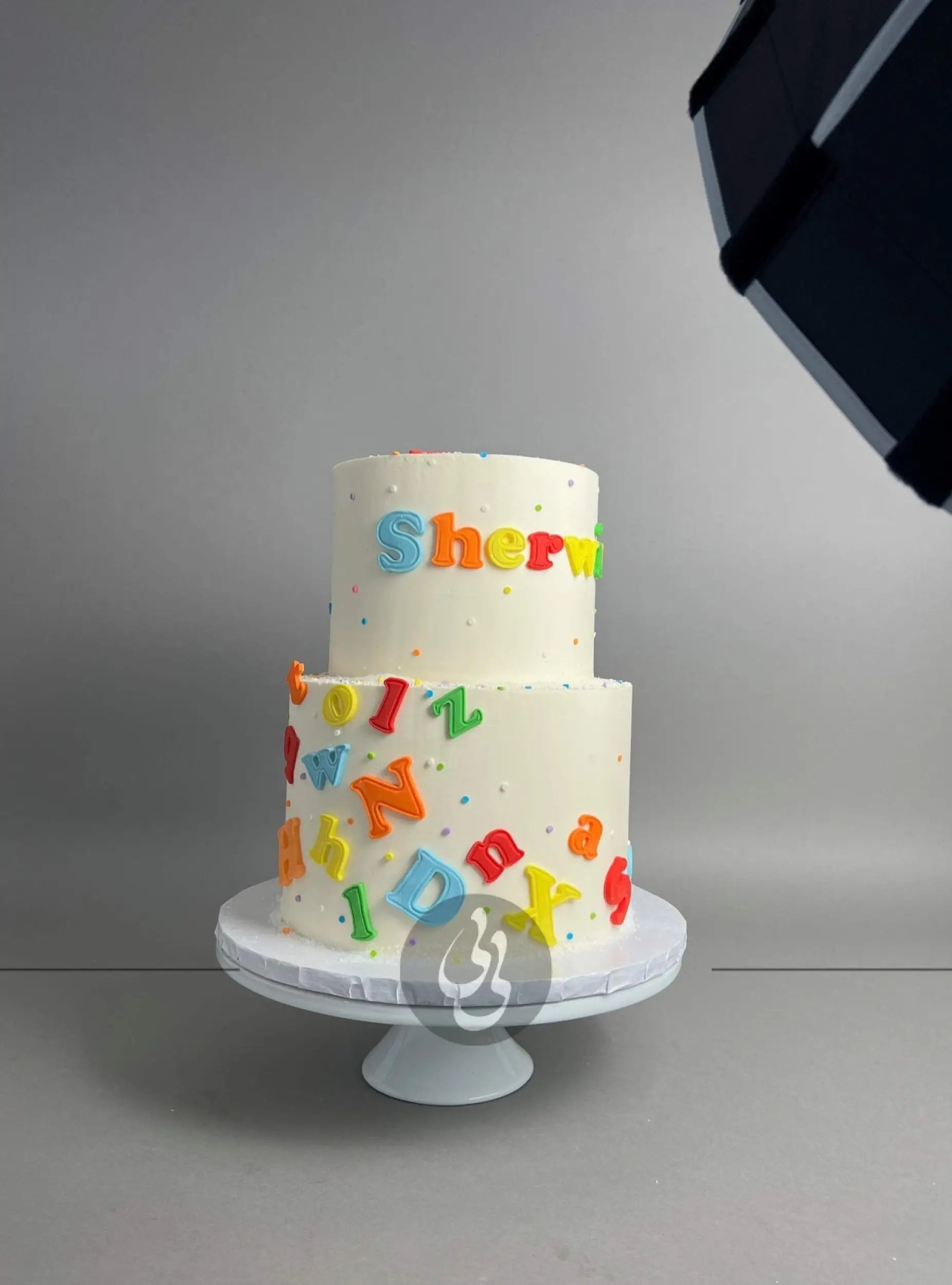 Alphabets on buttercream - custom cake
