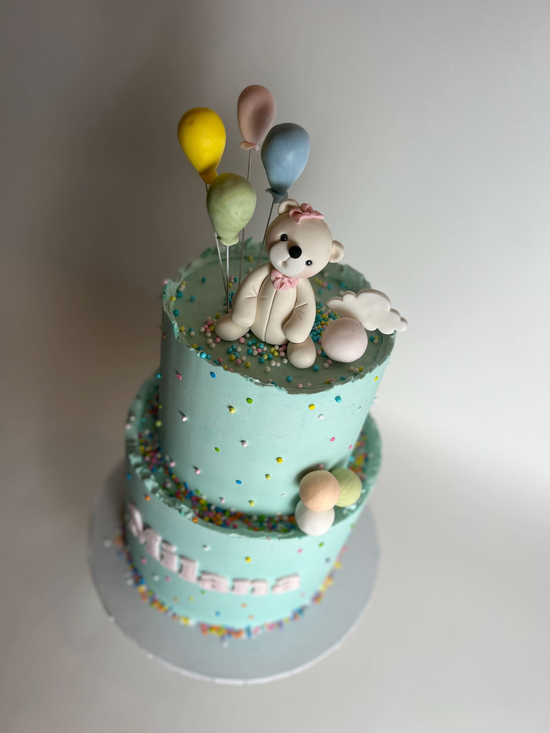 Animal & balloons on buttercream - custom cake