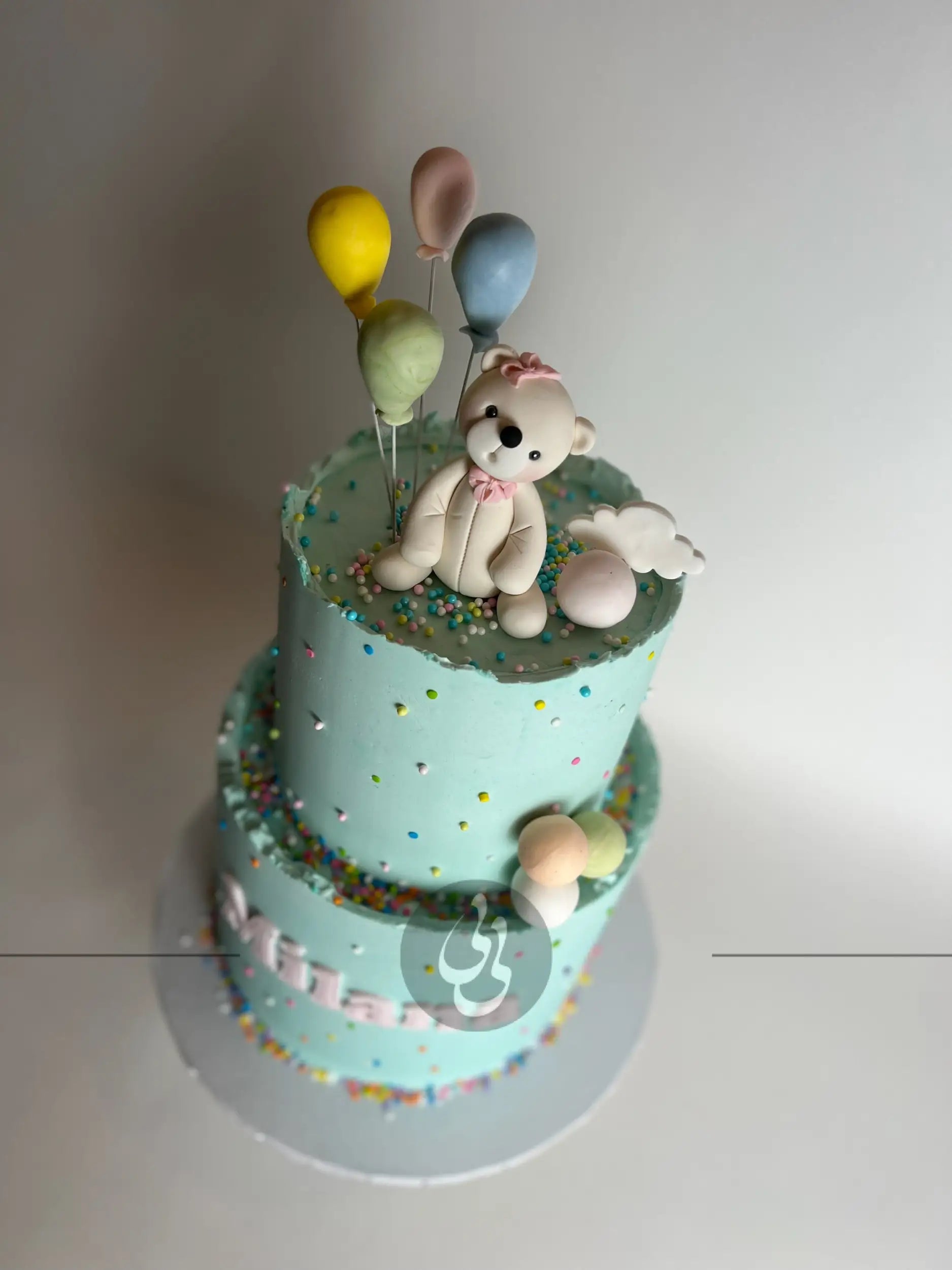 Animal & balloons on buttercream - custom cake