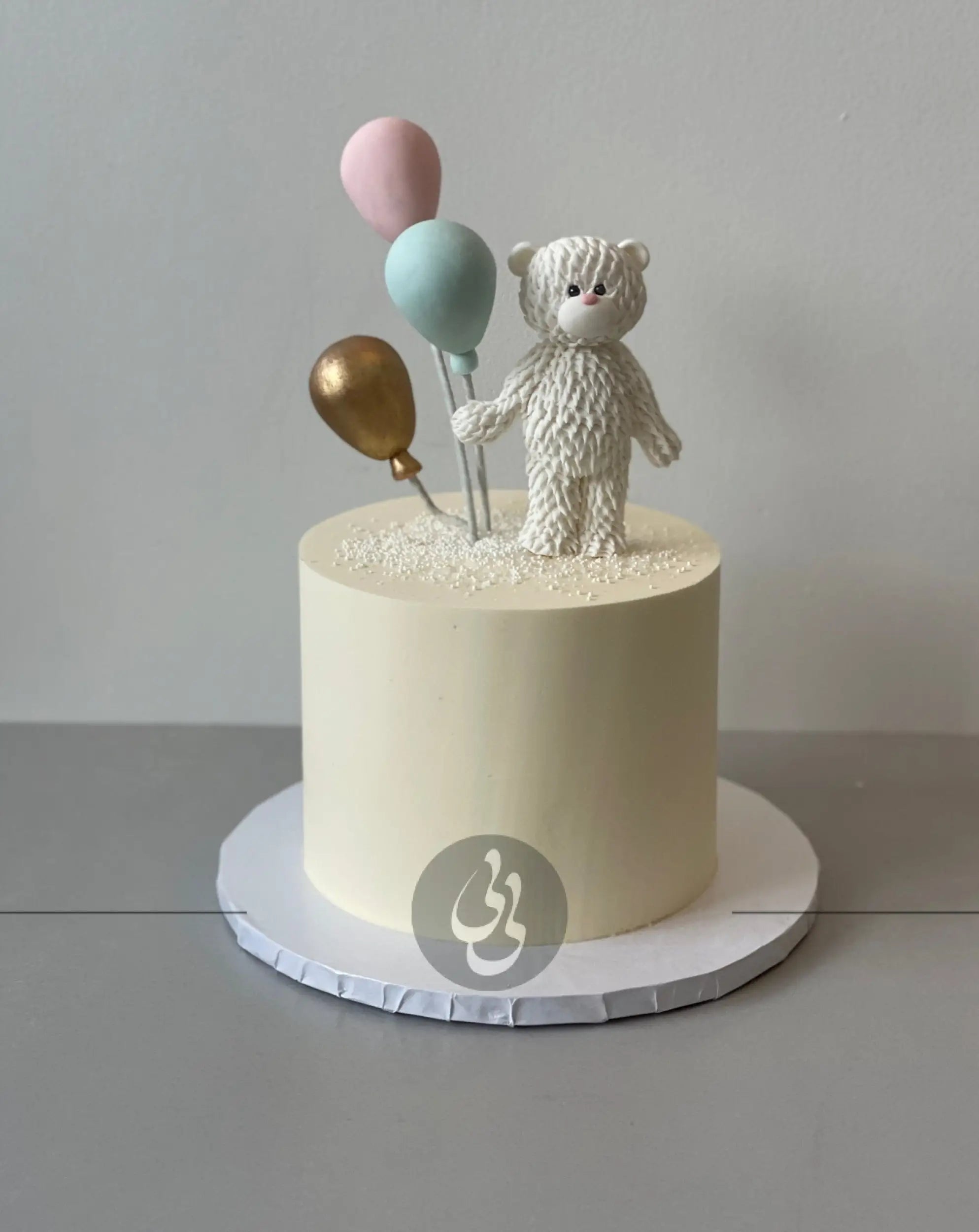 Animal & balloons on buttercream - custom cake