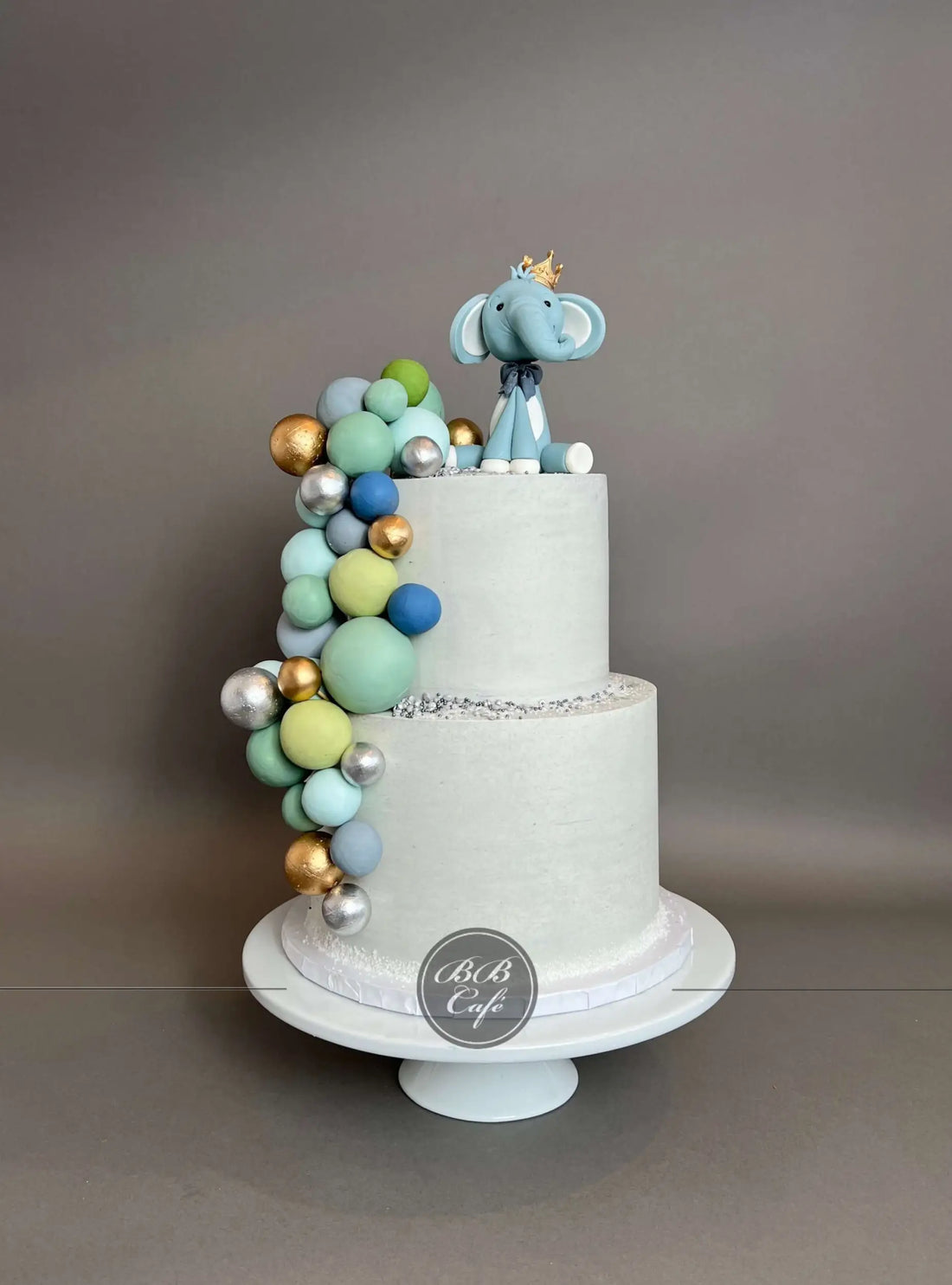 Animals &amp; spheres on buttercream - custom cake