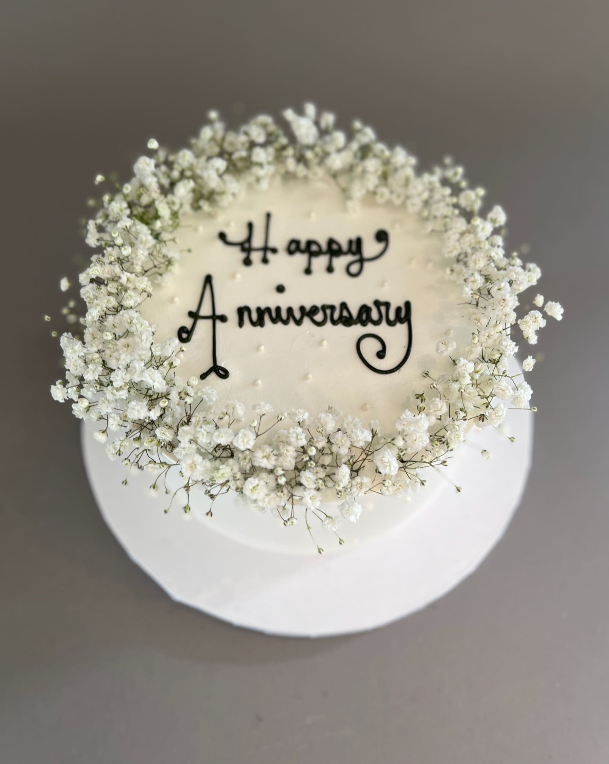 Baby’s breath on whipped cream - custom cake