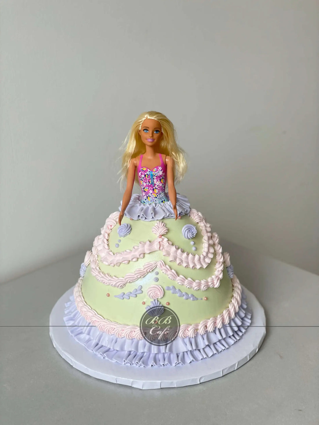 Barbie doll lambeth dress in whipped cream - custom cake