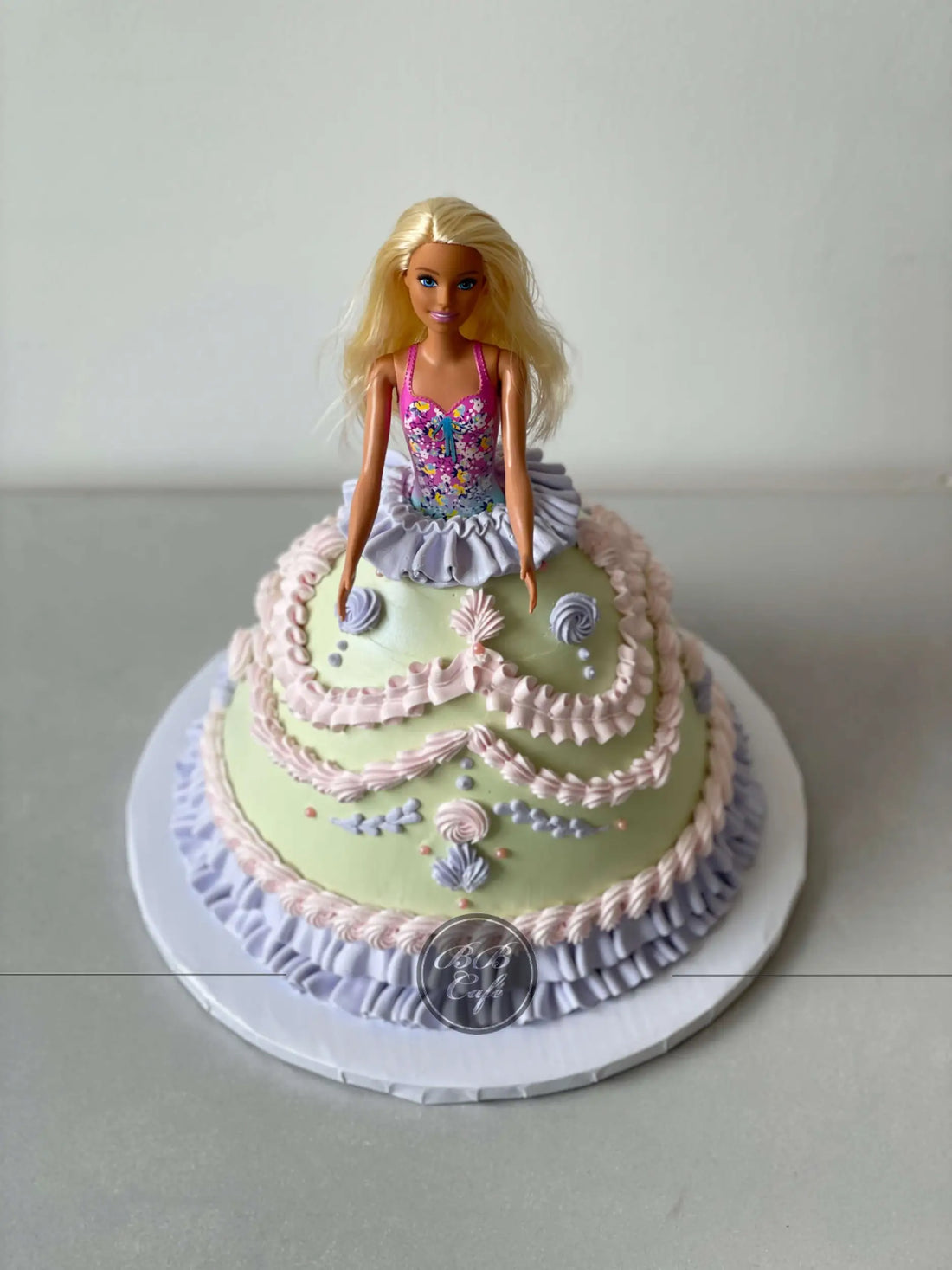 Barbie doll lambeth dress in whipped cream - custom cake