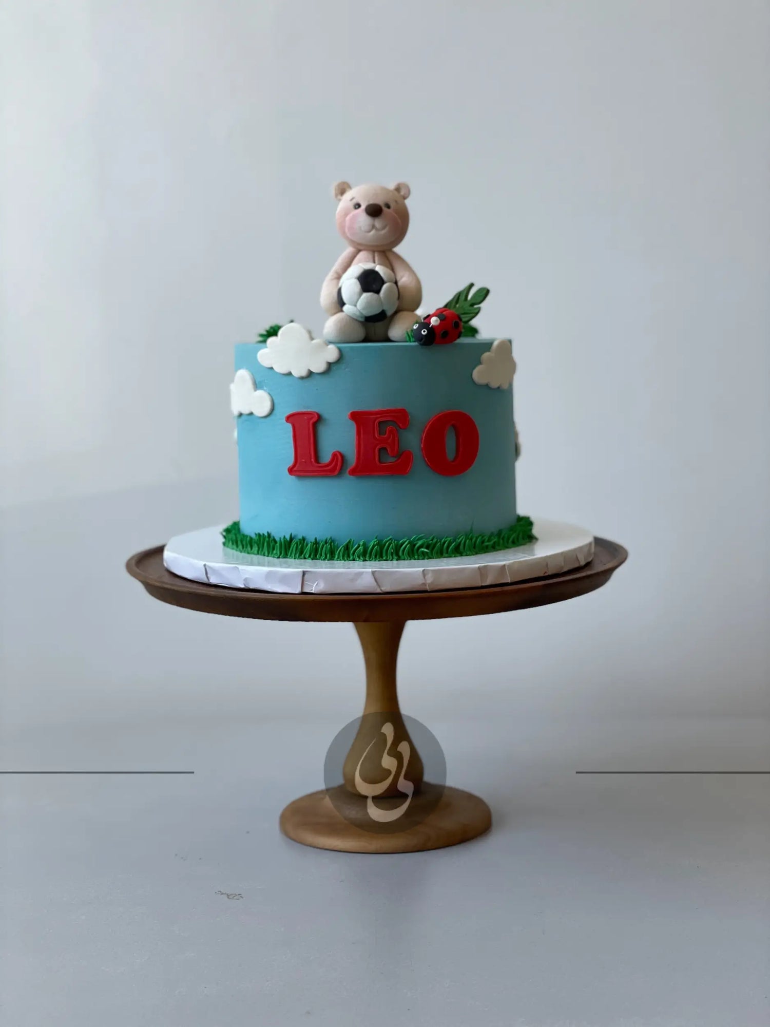 Bear & soccer on buttercream - custom cake
