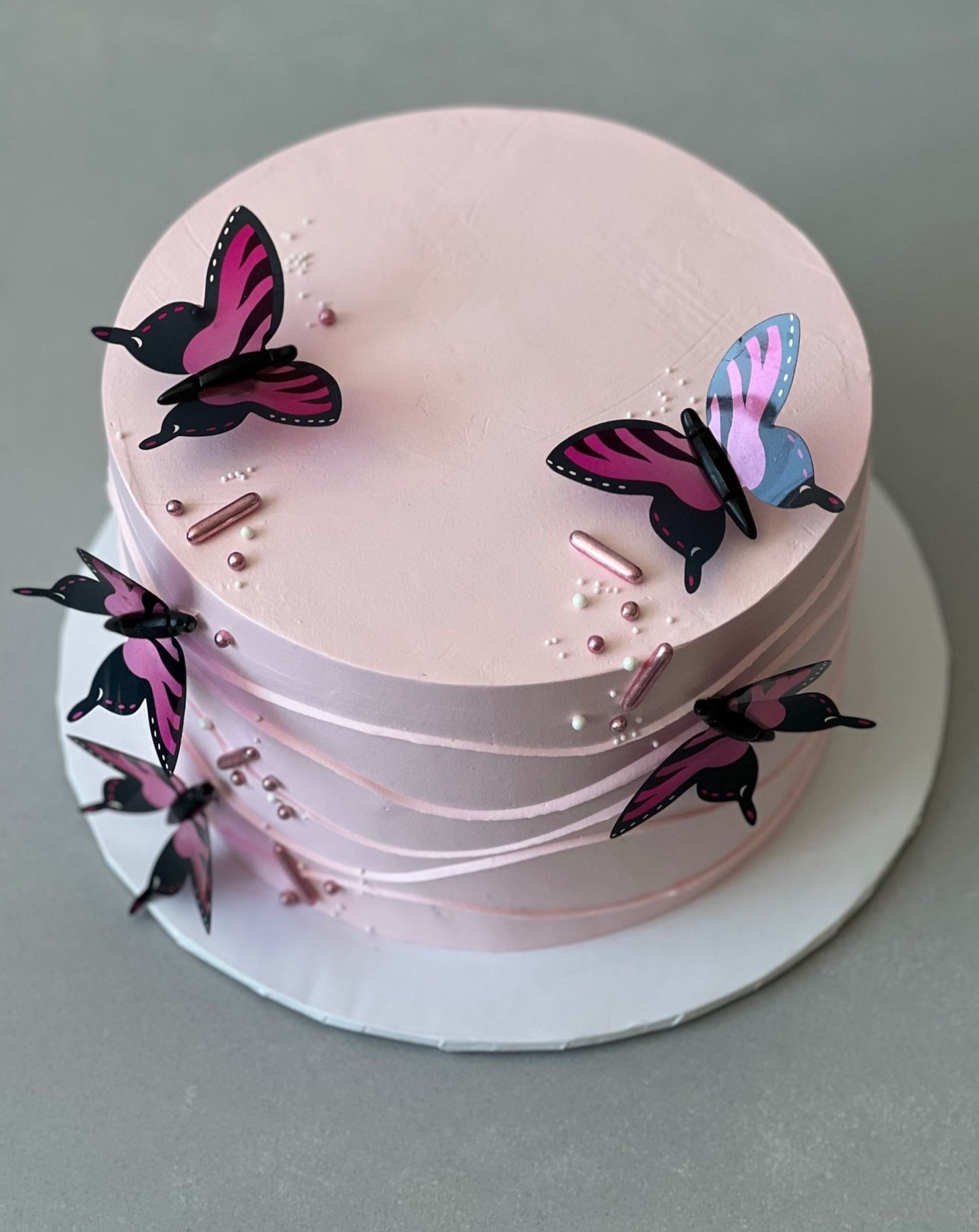 Butterfly on whipped cream - custom cake