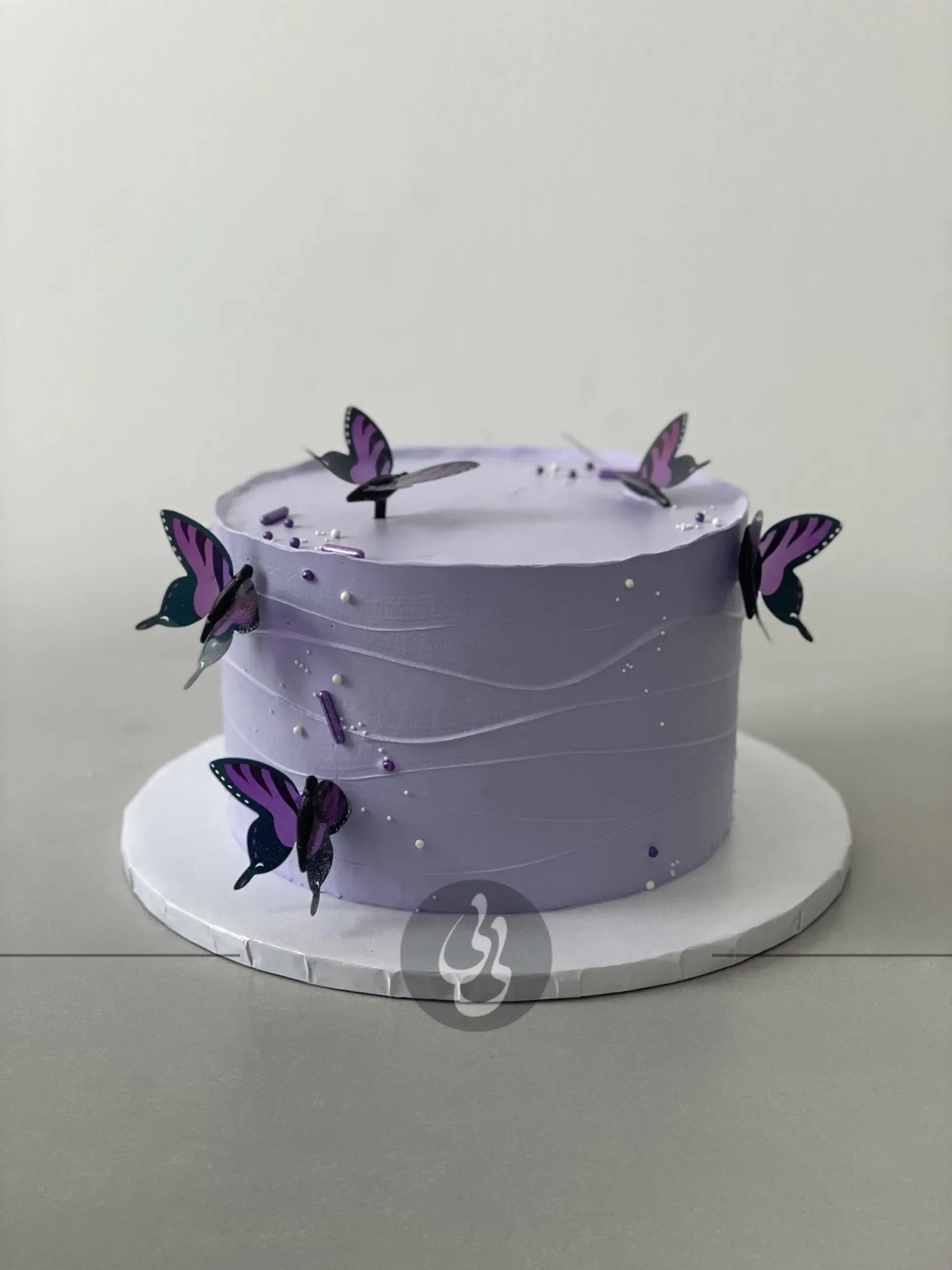 Butterfly on whipped cream - custom cake