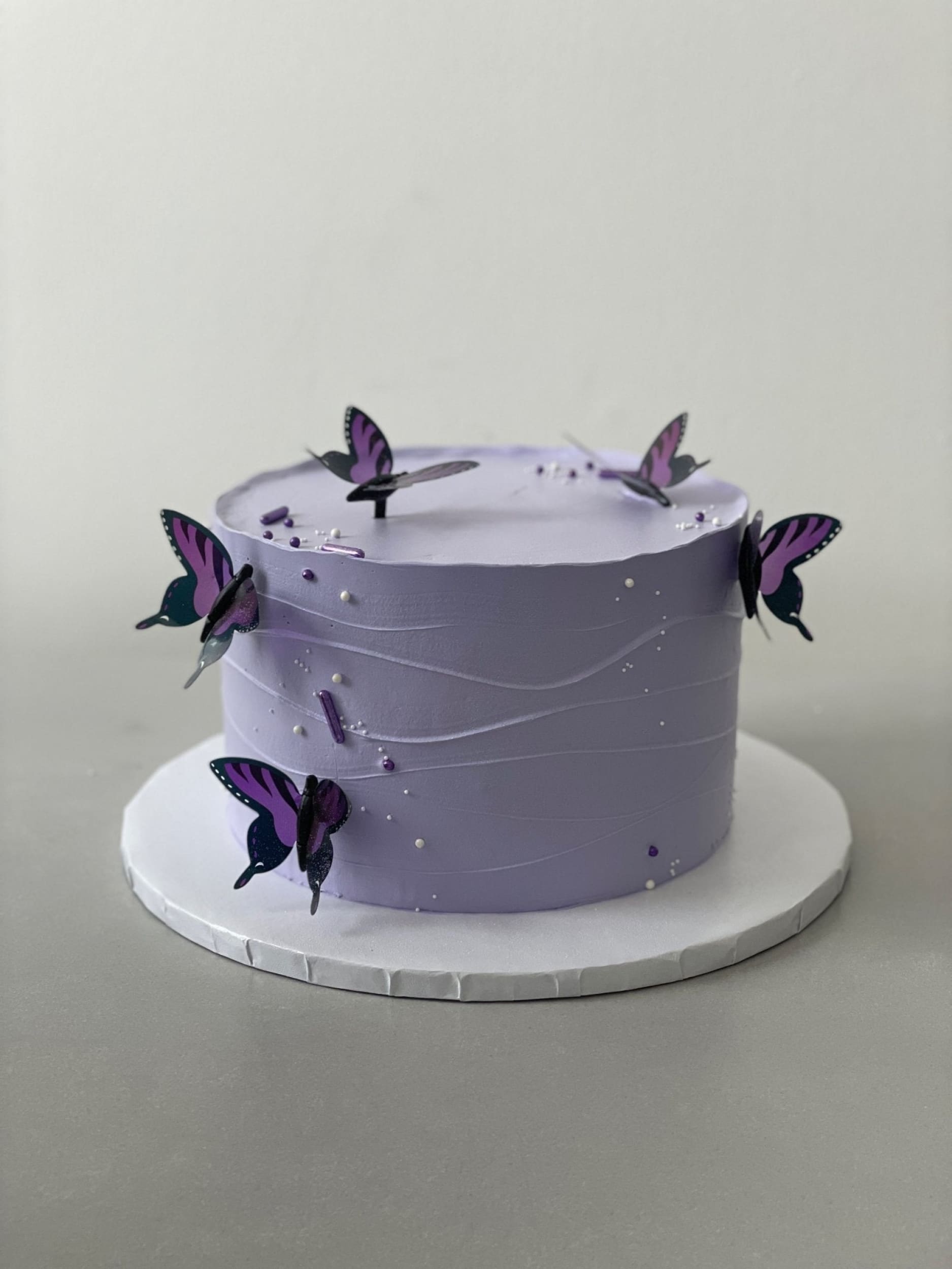 Butterfly on whipped cream - custom cake