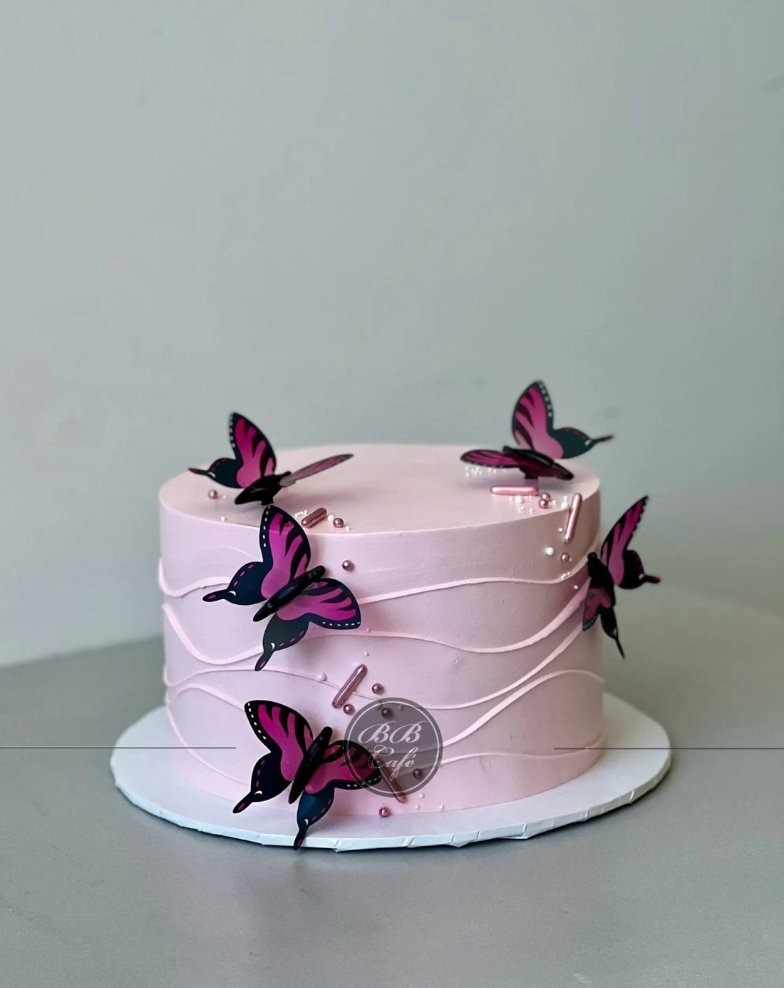 Butterfly on whipped cream - custom cake