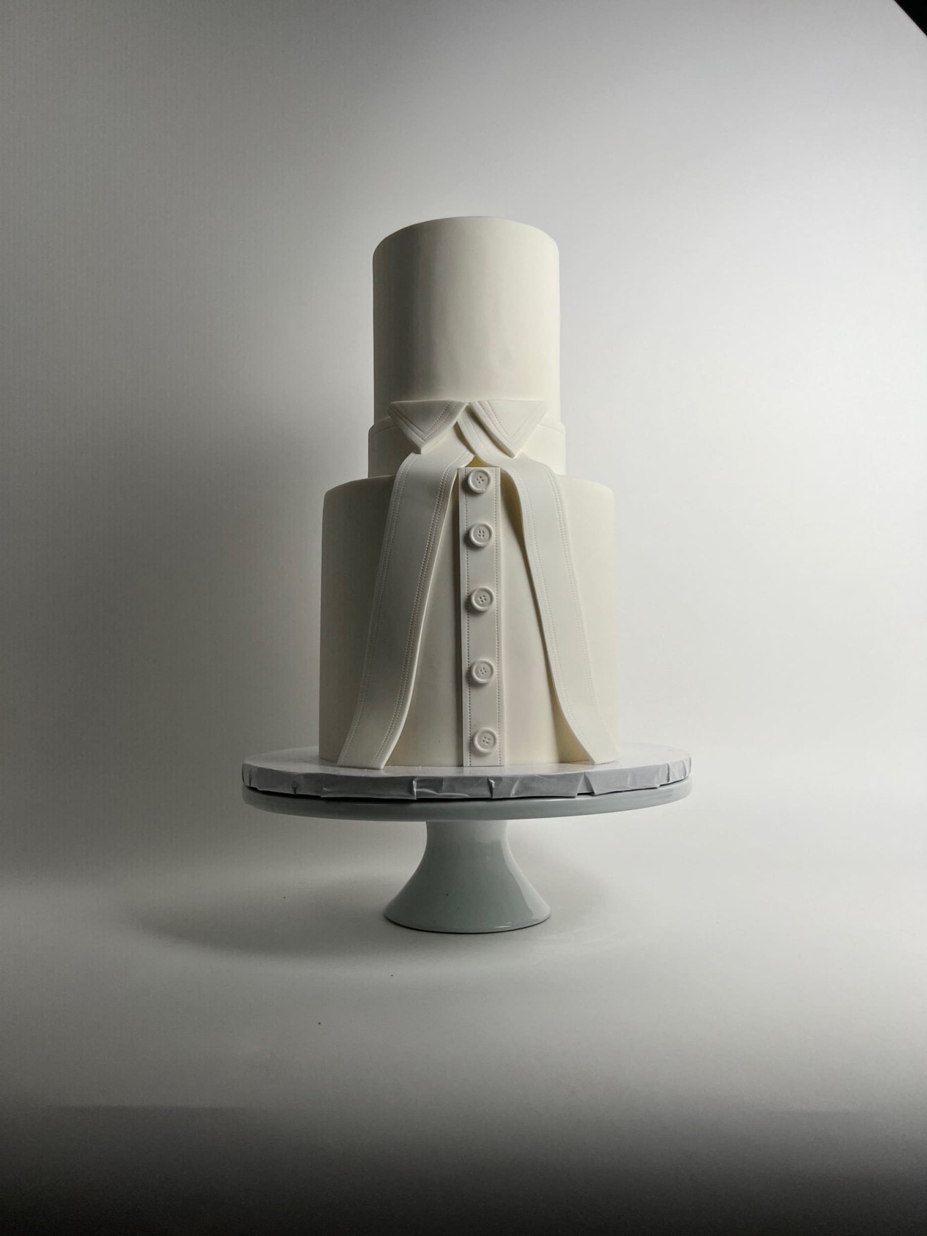 Called to the bar in white fondant - custom cake