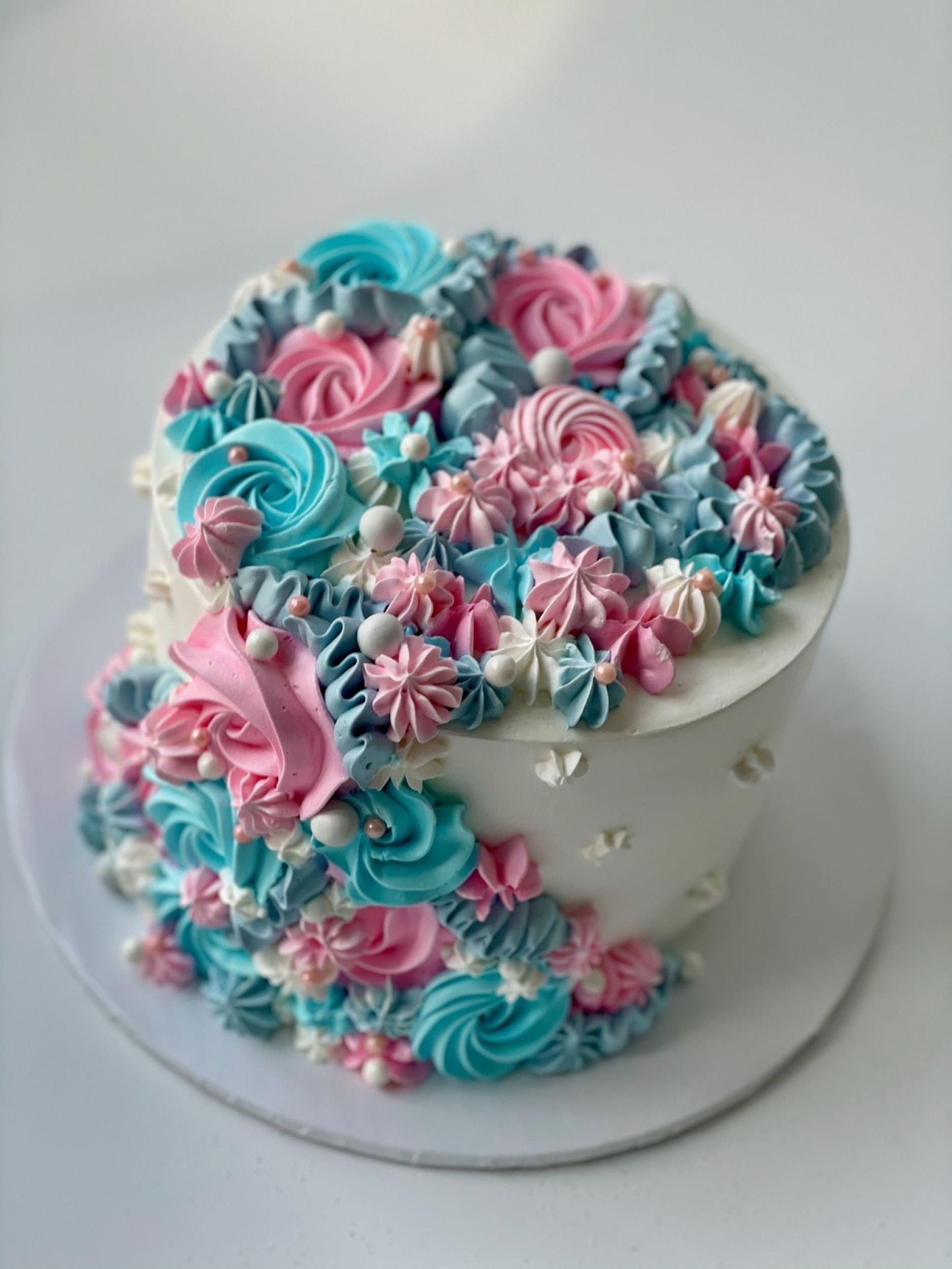 Cascading rosettes in whipped cream - custom cake