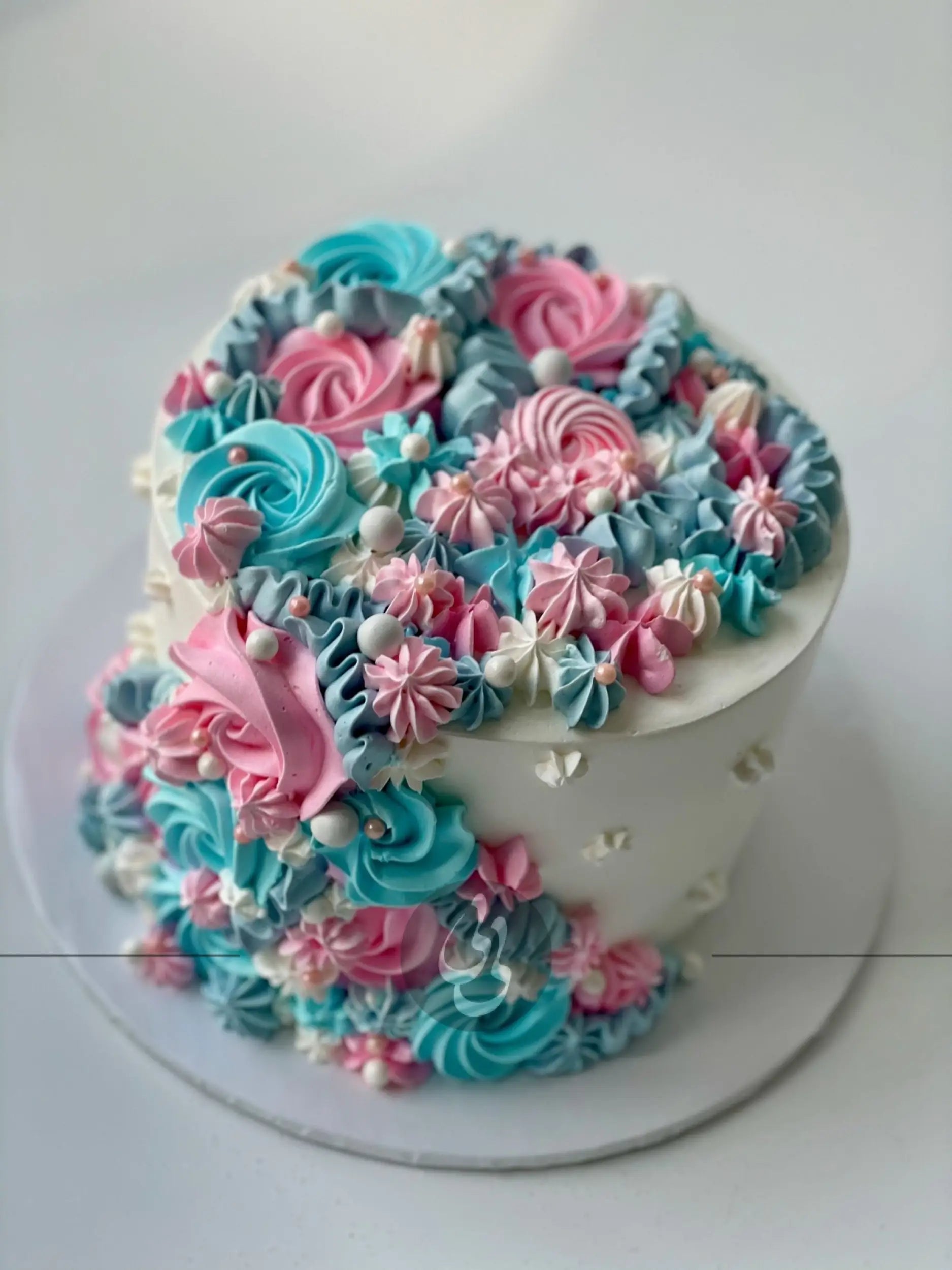 Cascading rosettes in whipped cream - custom cake
