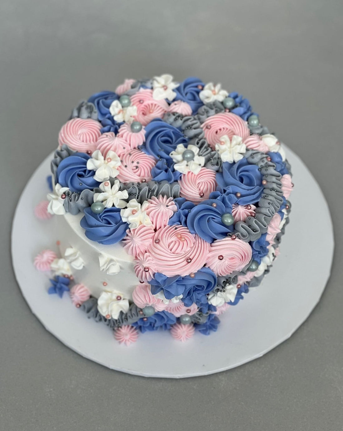 Cascading rosettes in whipped cream - custom cake