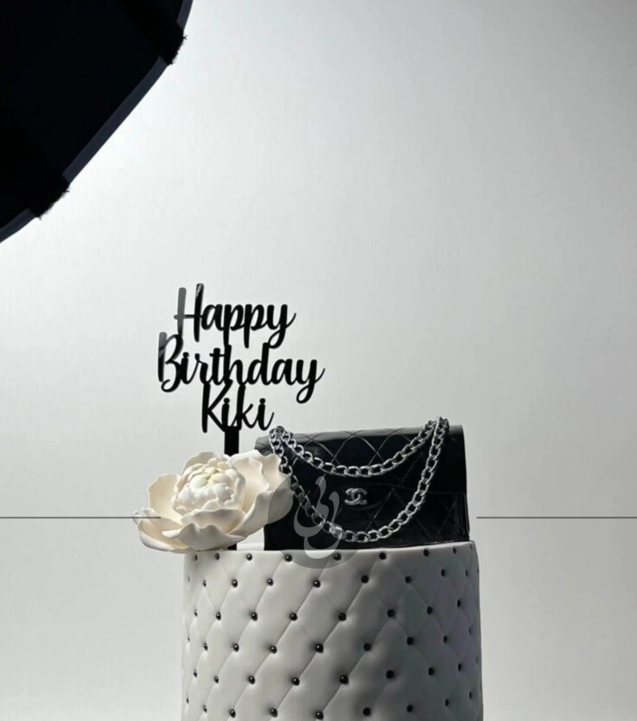 Chanel bag & sugar flower on quilted fondant - custom cake