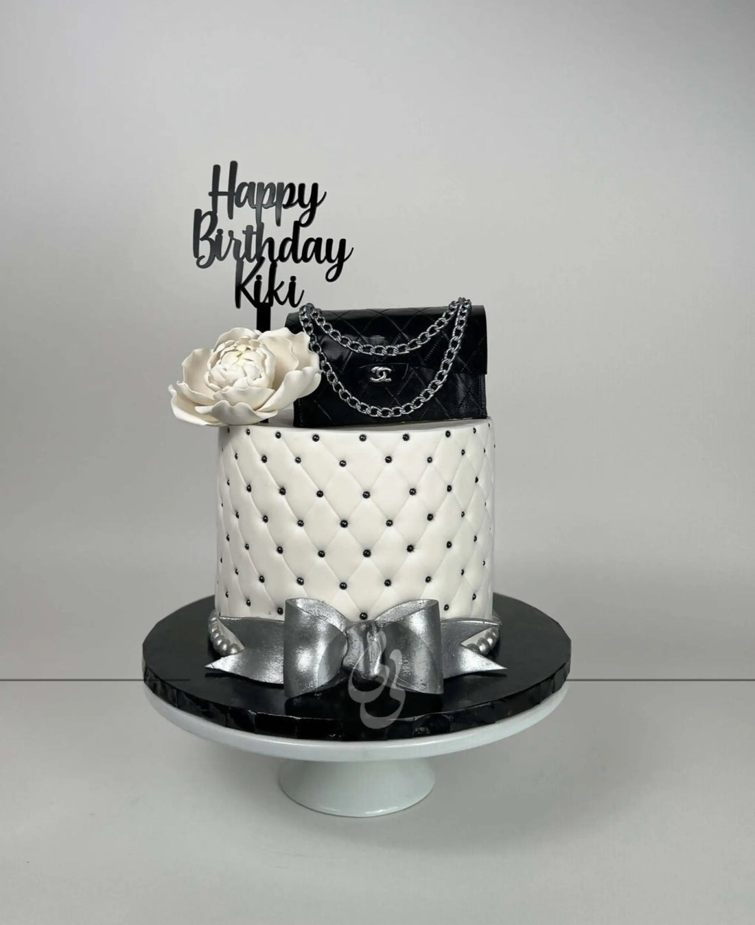 Chanel bag & sugar flower on quilted fondant - custom cake
