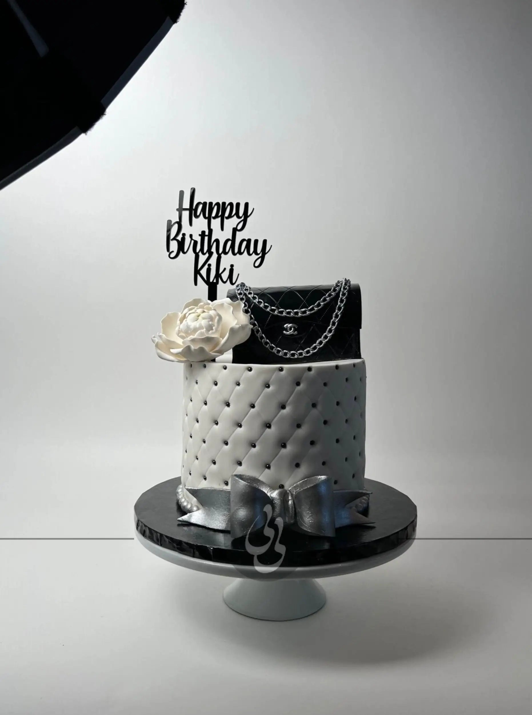 Chanel bag & sugar flower on quilted fondant - custom cake