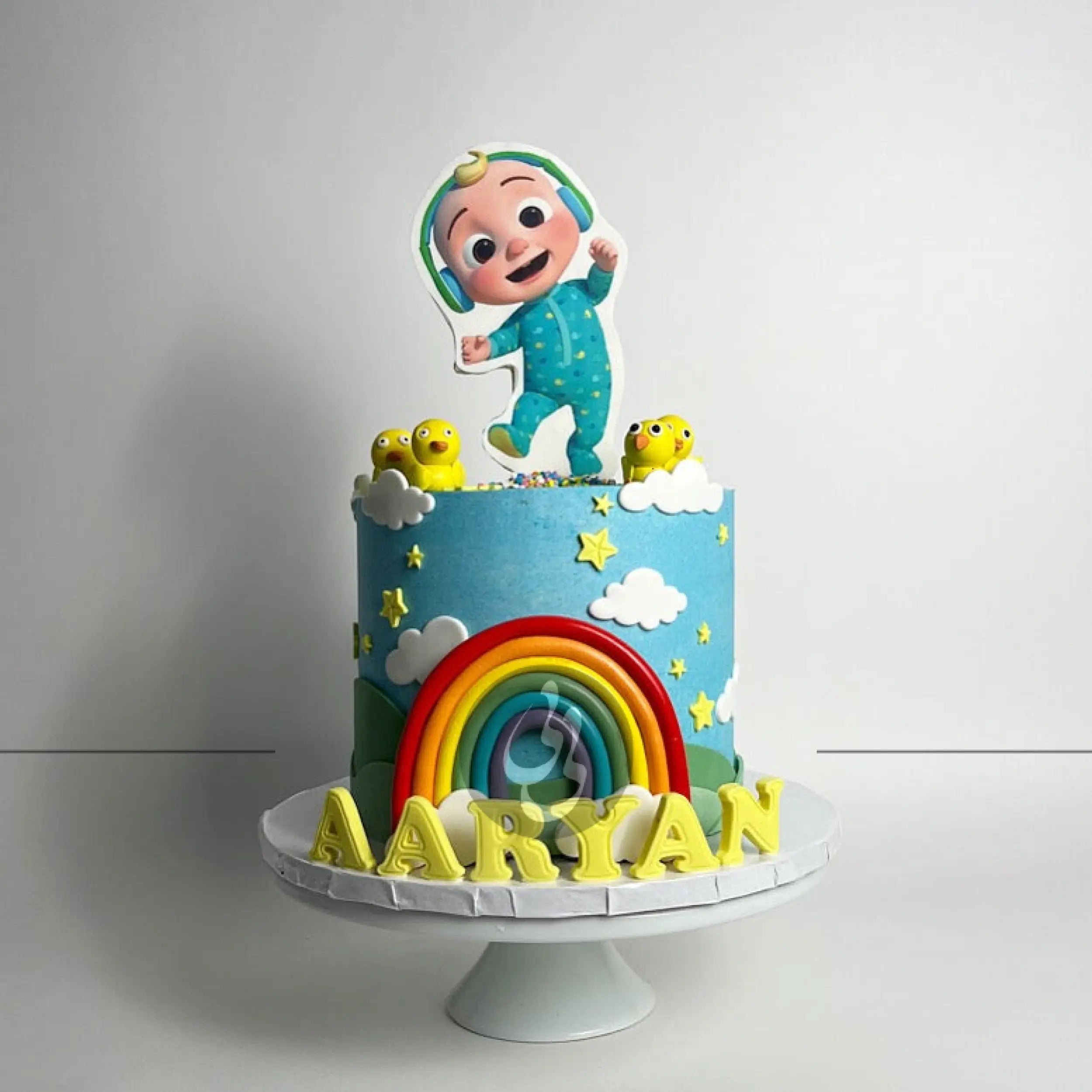 Cocomelon jj & rainbow in edible print - custom cake