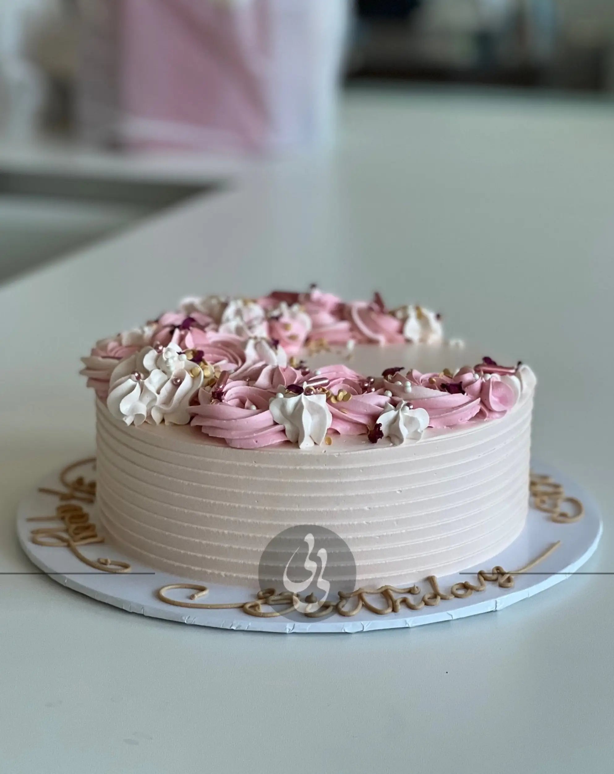 Crescent moon rosettes in whipped cream - custom cake