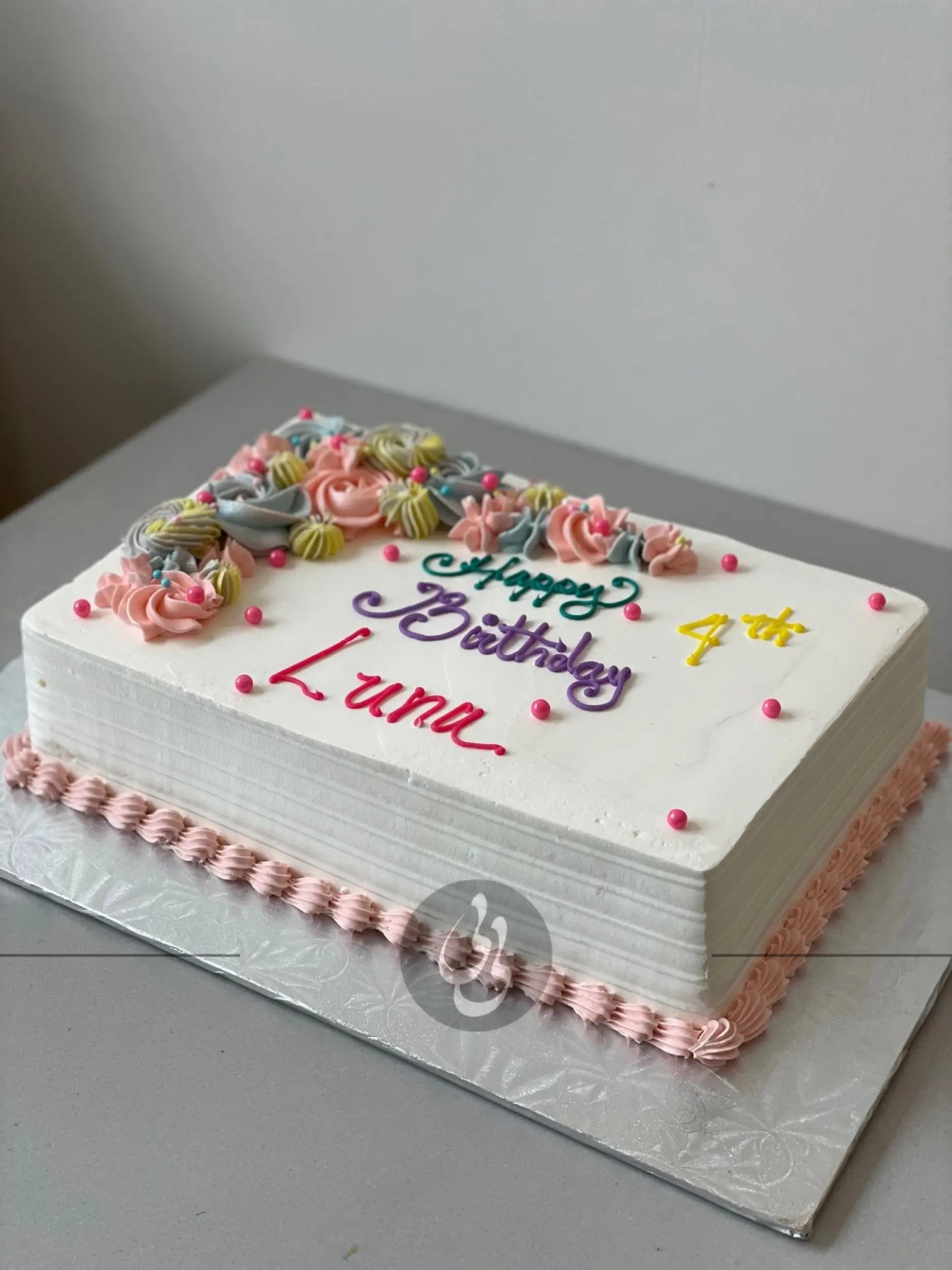 Crescent moon rosettes in whipped cream - custom cake