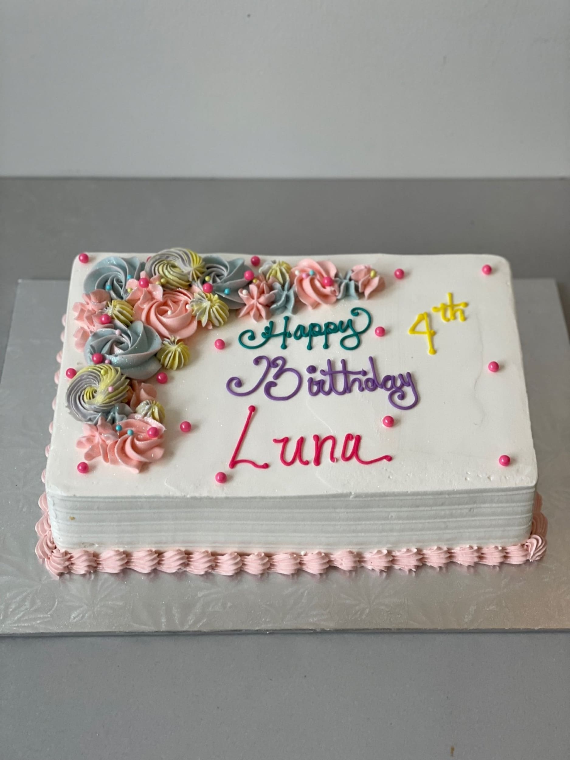 Crescent moon rosettes in whipped cream - custom cake