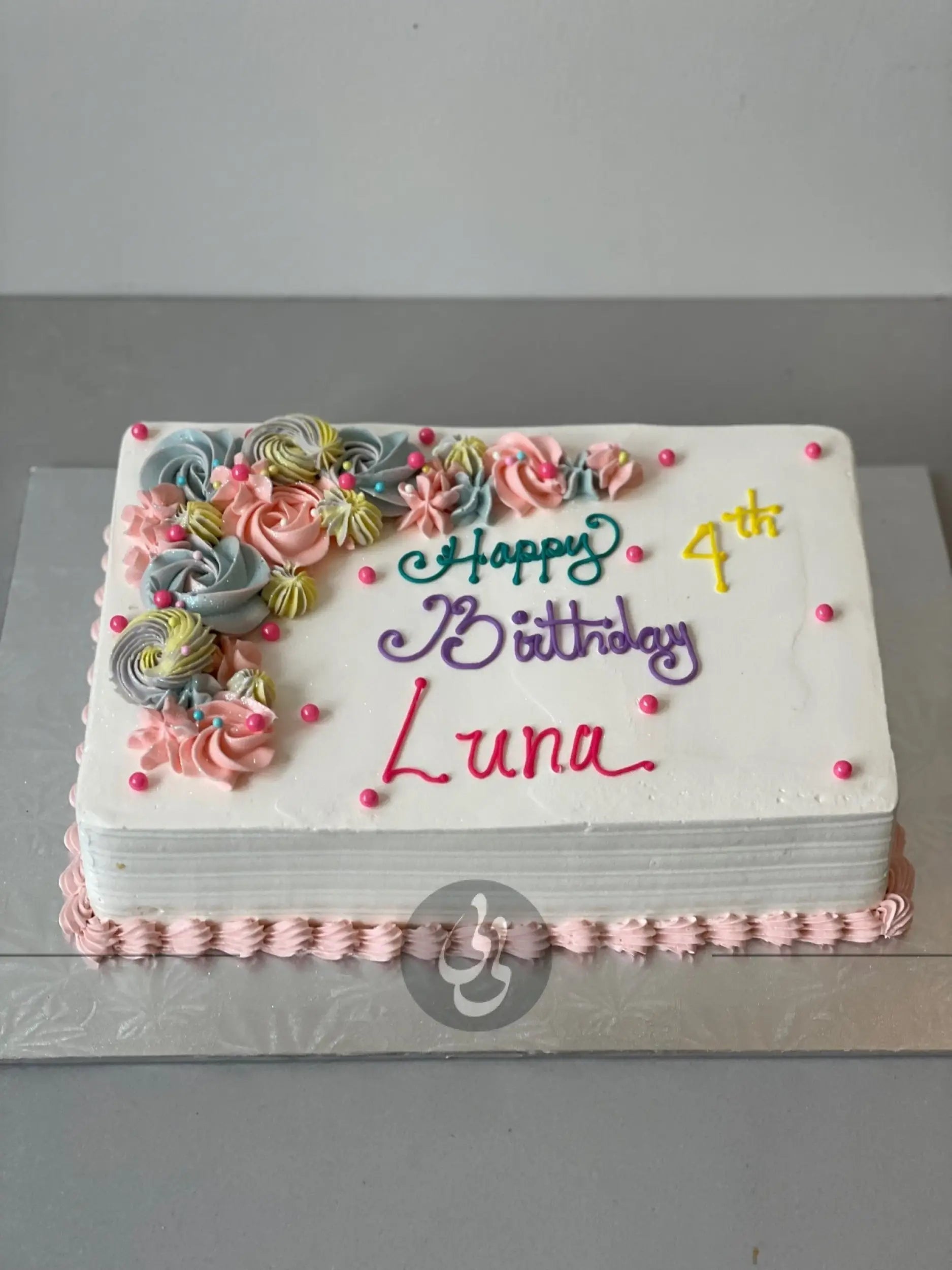 Crescent moon rosettes in whipped cream - custom cake