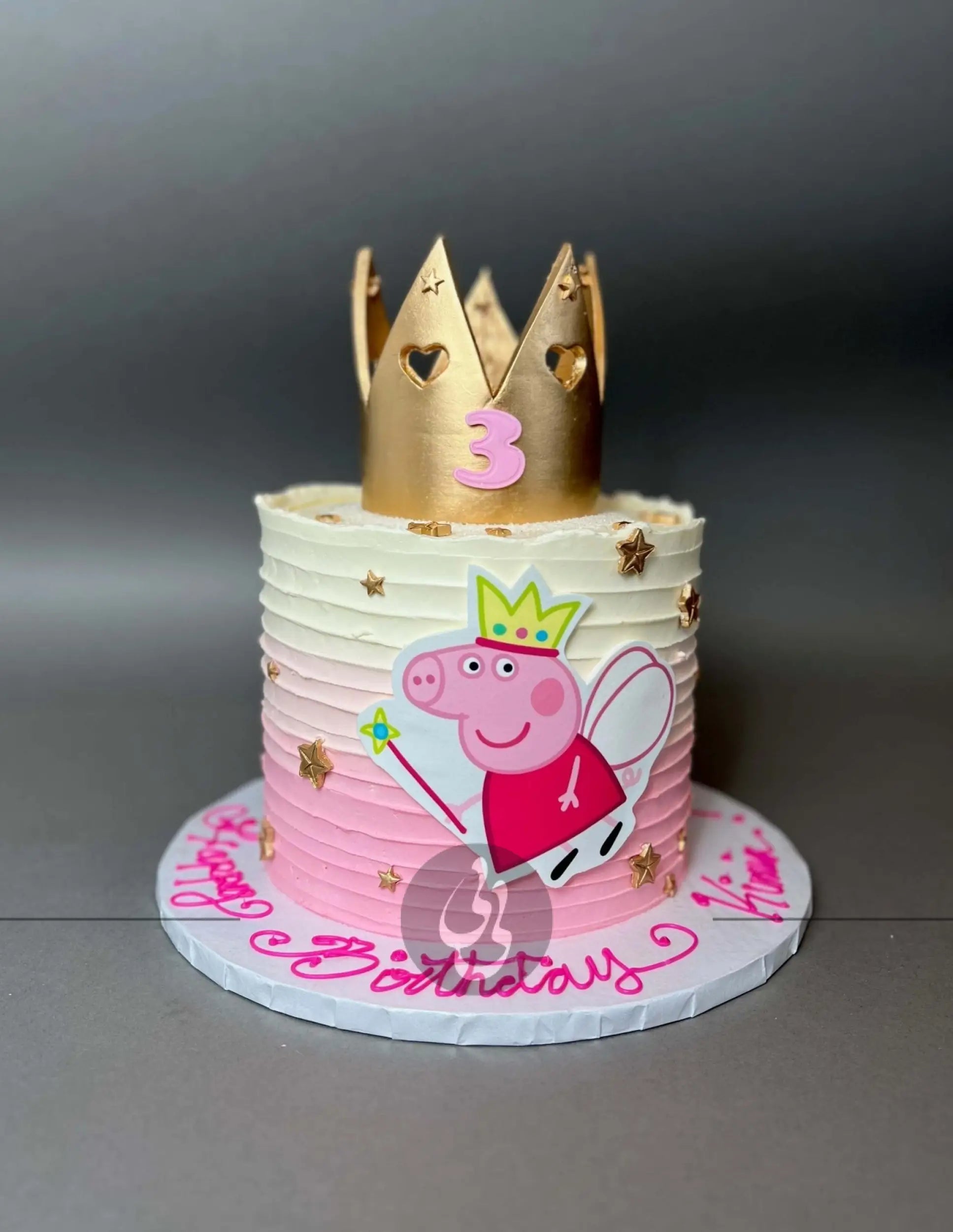 Crown and edible print of peppa pig on buttercream - custom cake