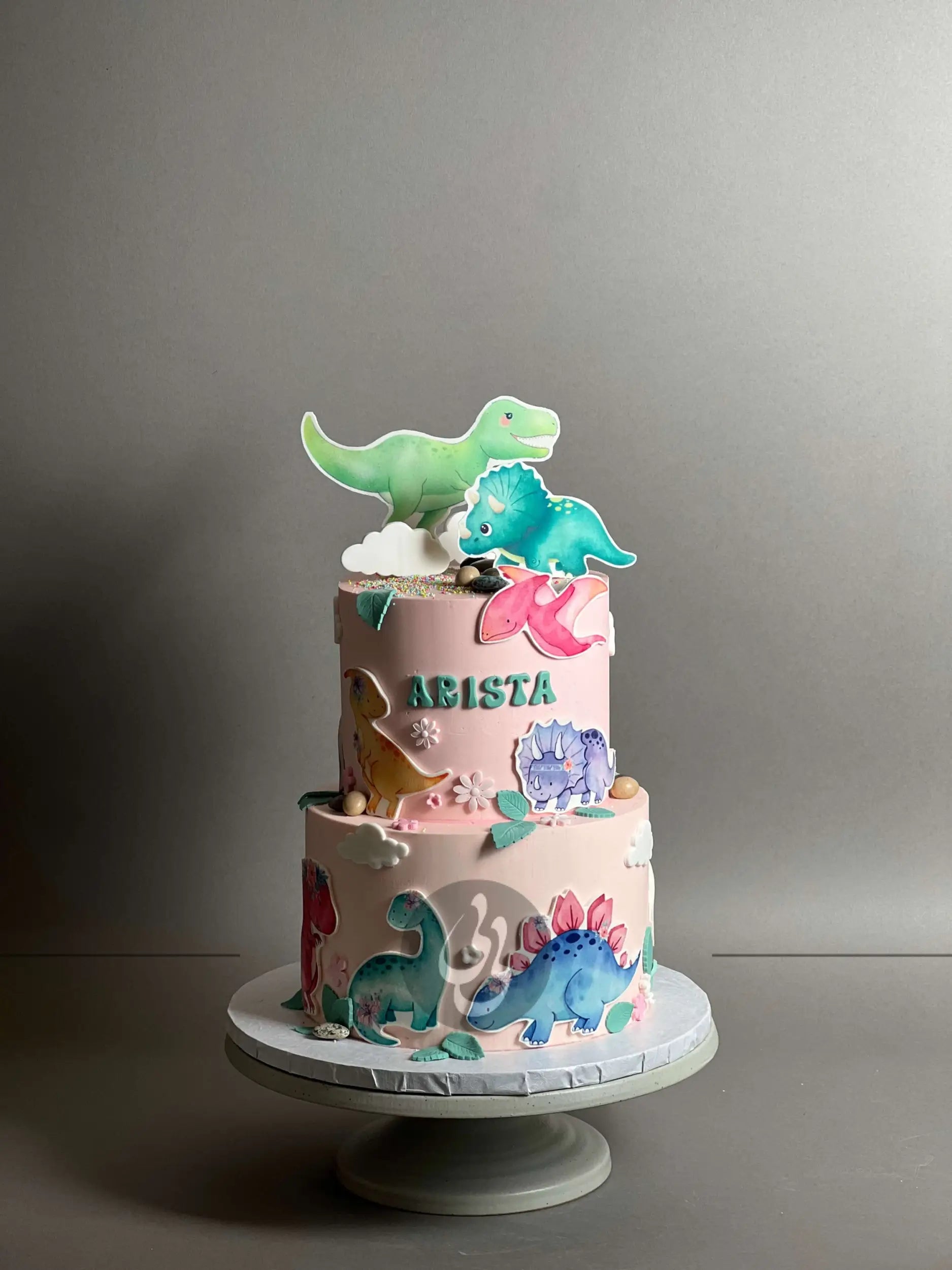 Dinosaur images on buttercream - custom cake