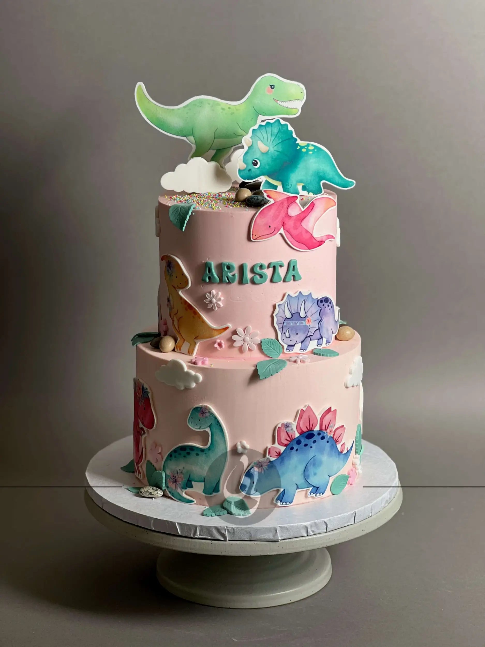 Dinosaur images on buttercream - custom cake