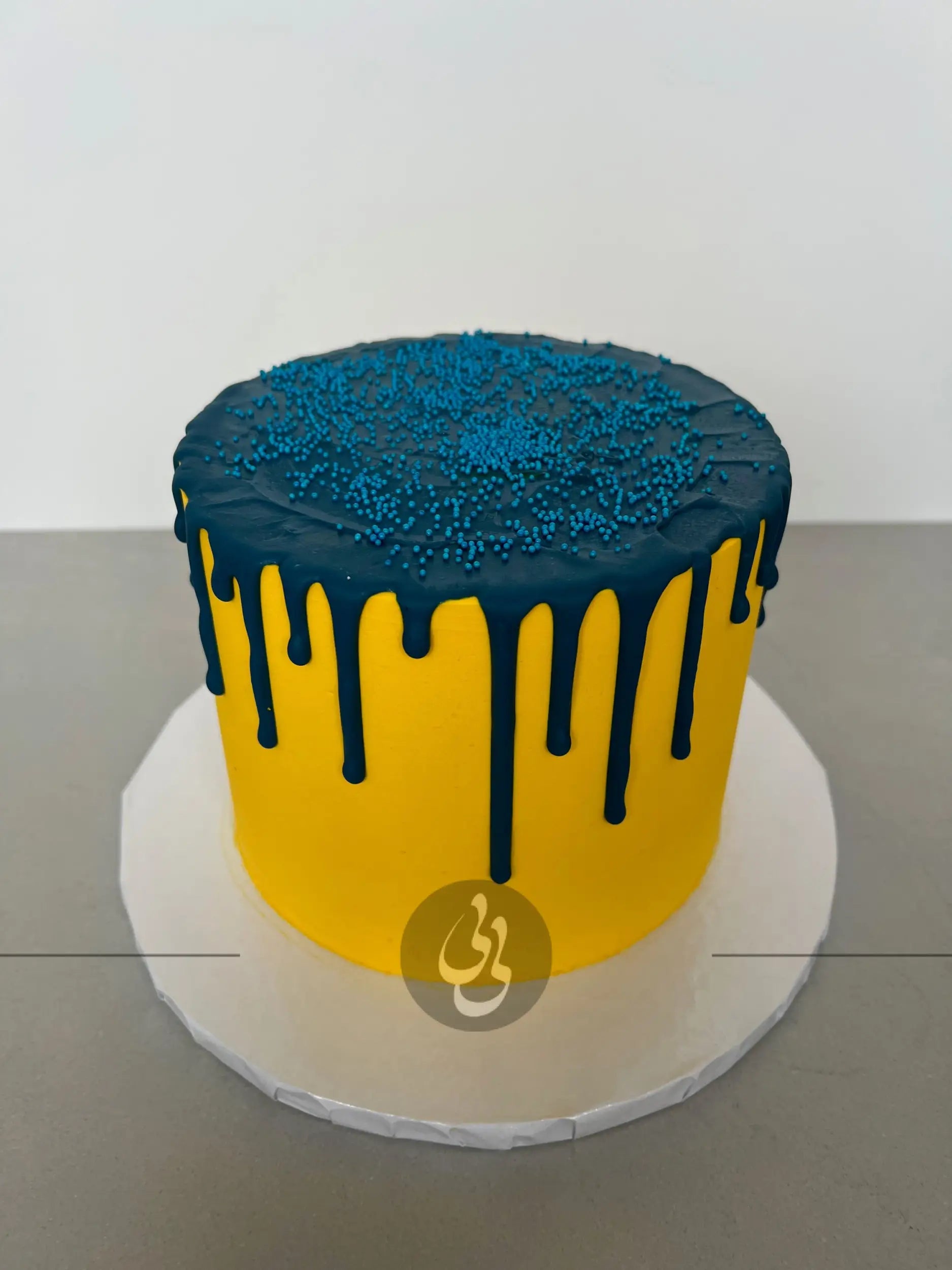 Drips & fresh flowers on buttercream - custom cake