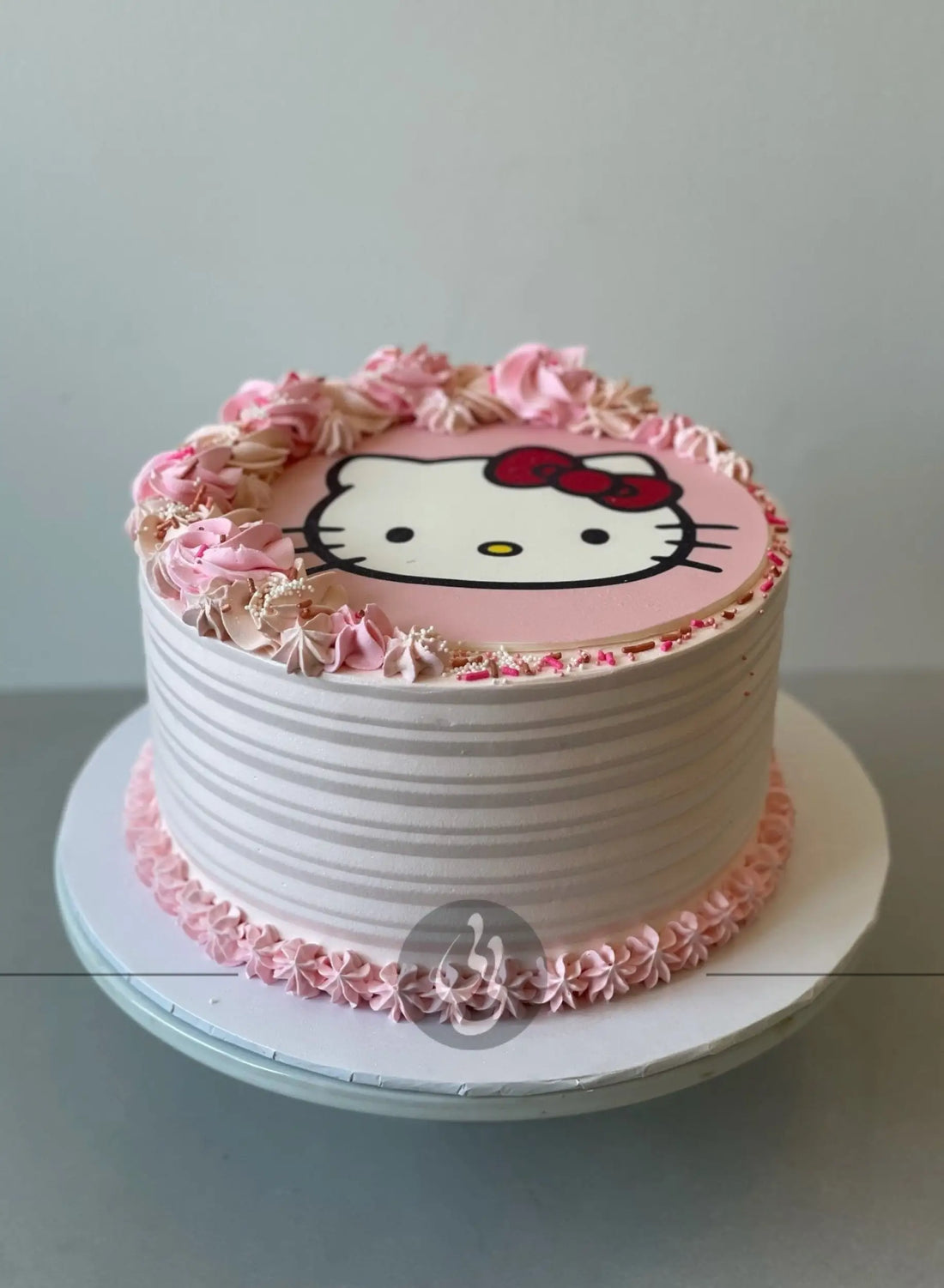 Edible print & rosettes on whipped cream - custom cake
