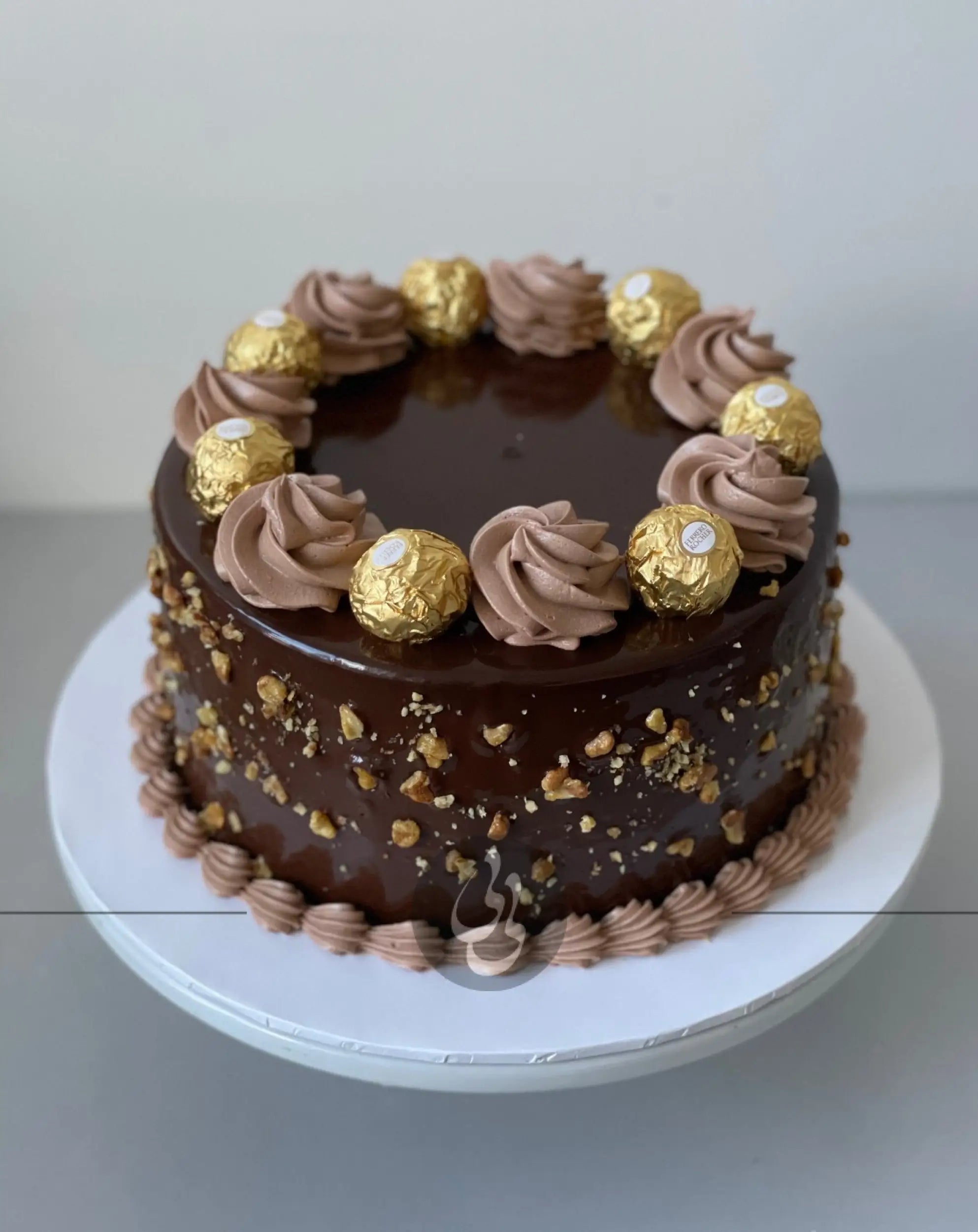 Ferrero rocher on ganache - custom cake
