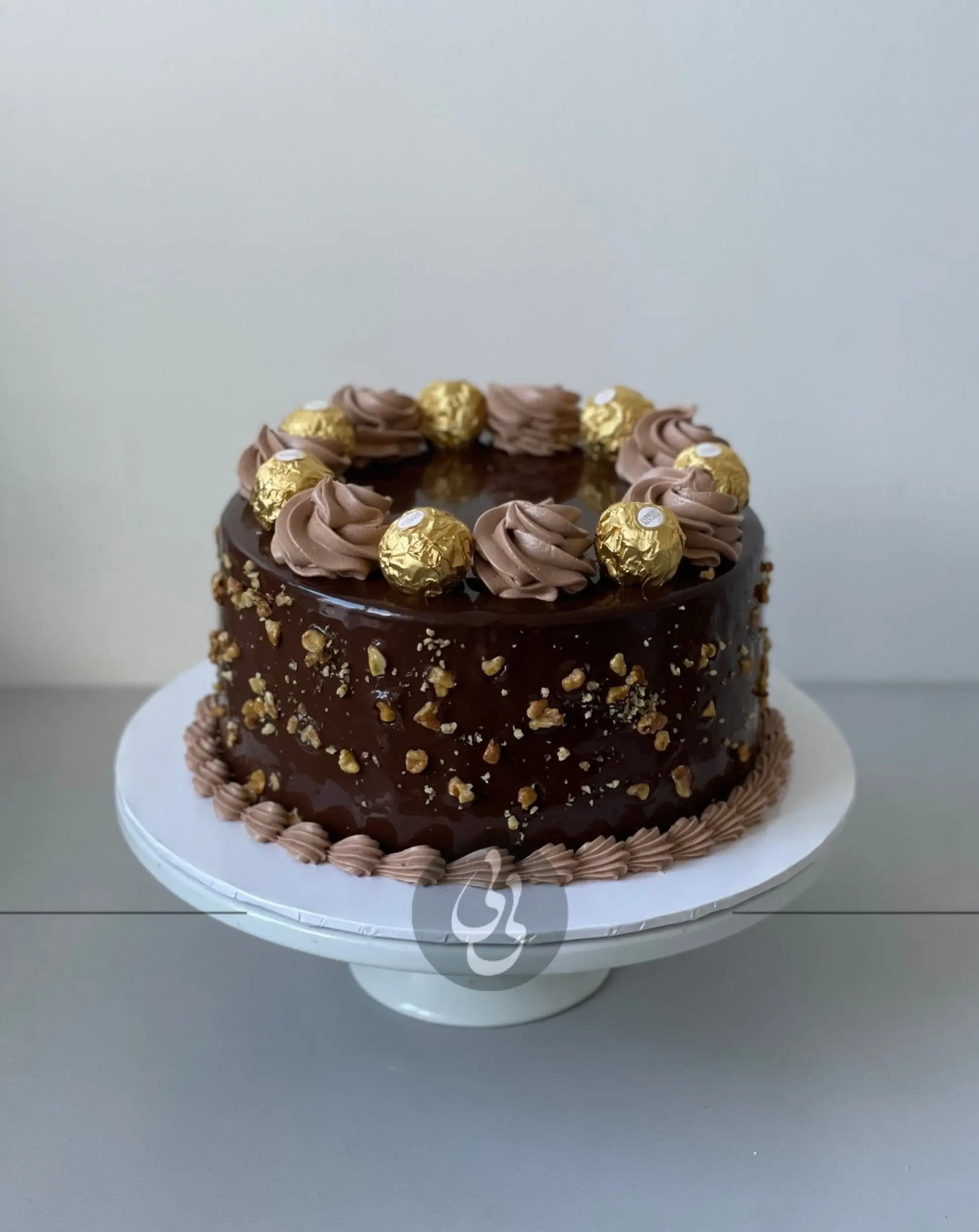 Ferrero rocher on ganache - custom cake
