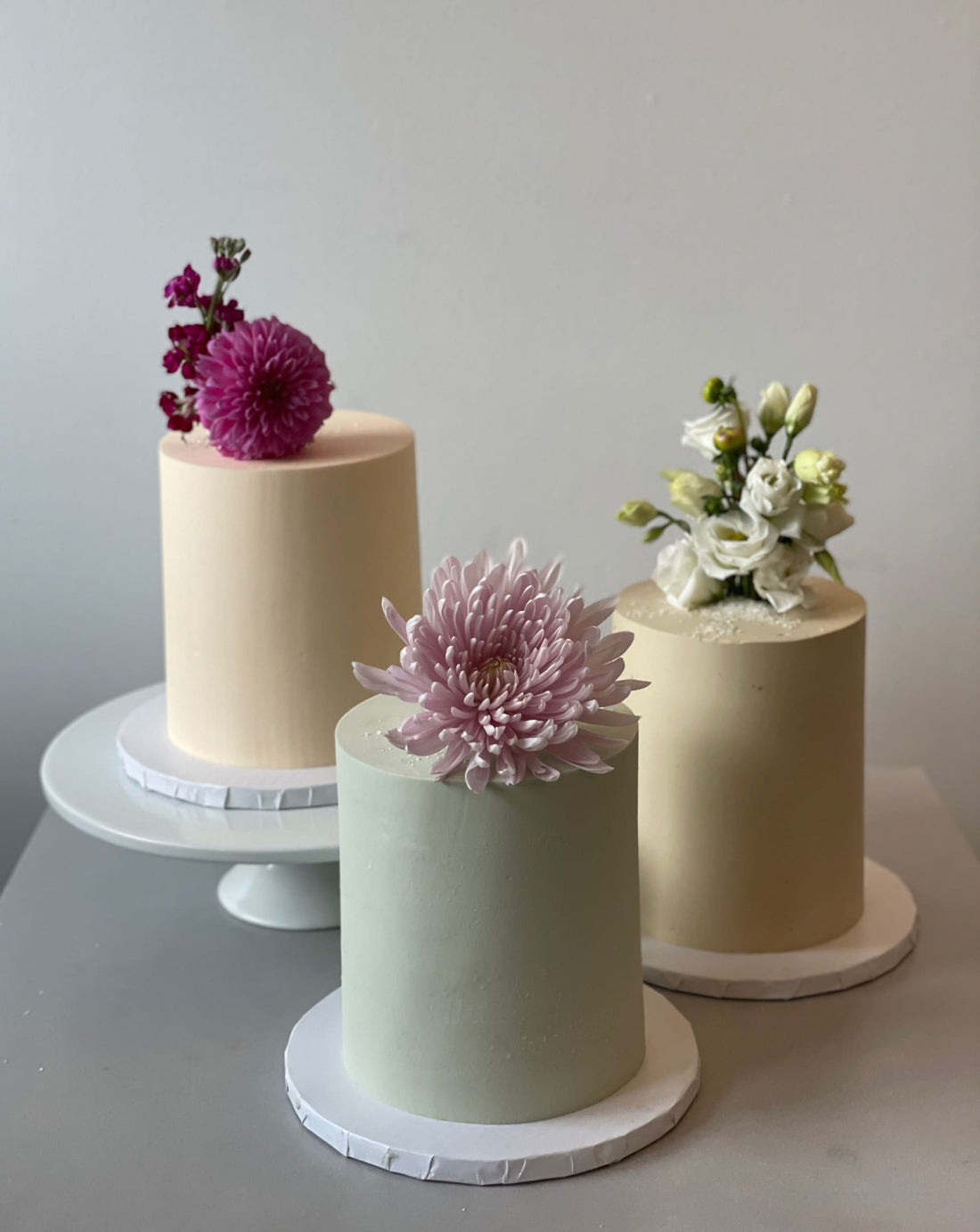 Fresh blooms on buttercream - wedding cake