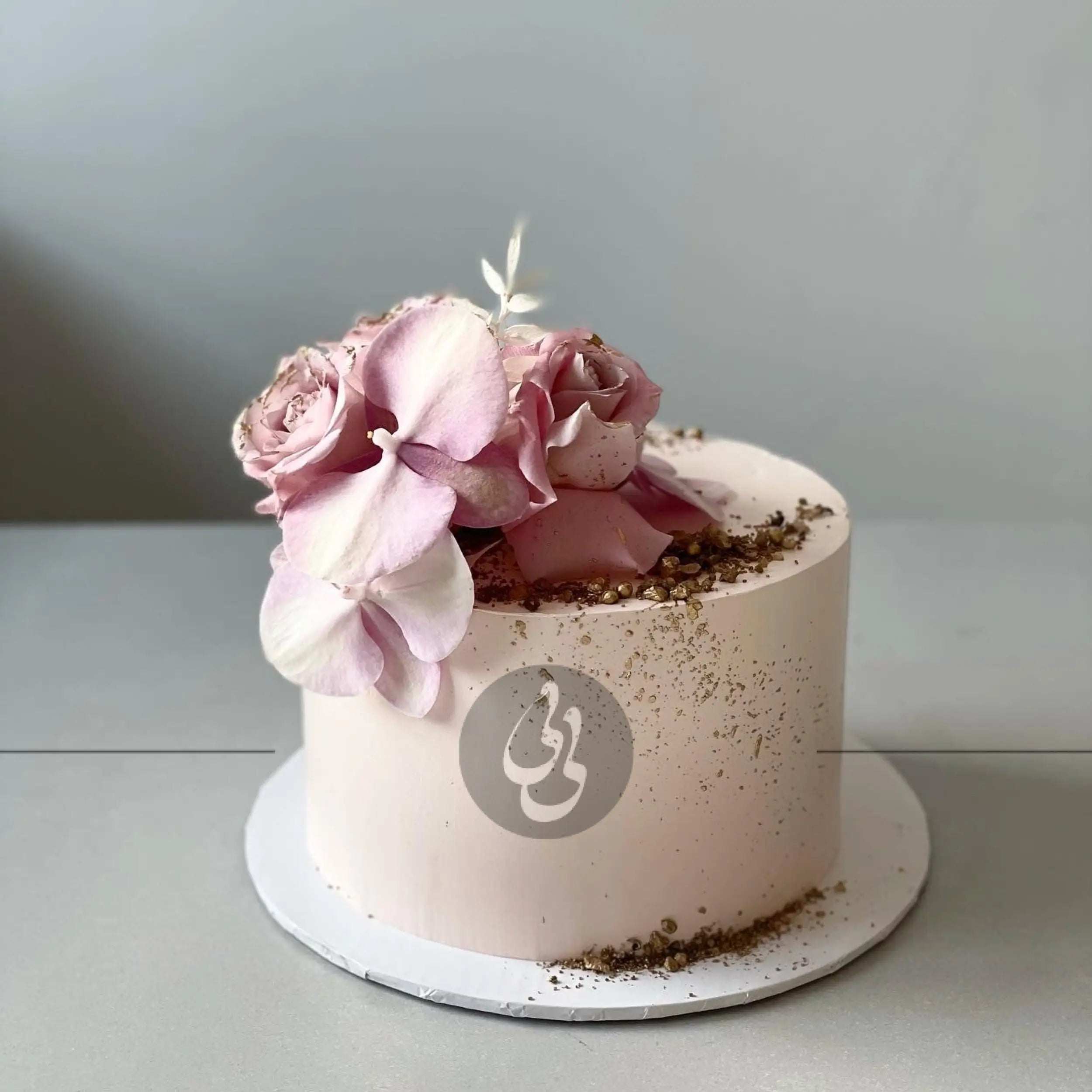 Fresh blooms on whipped cream - custom cake