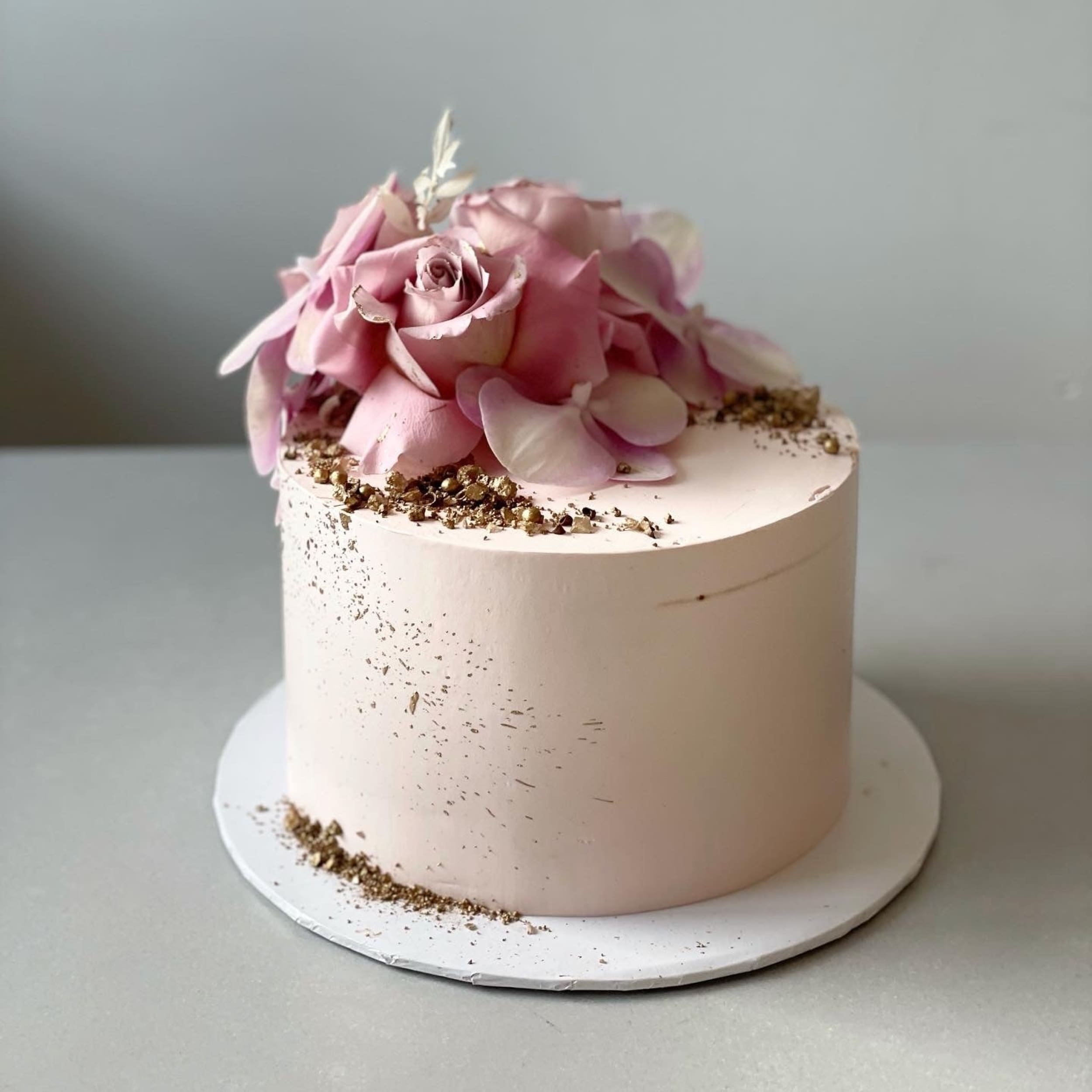 Fresh blooms on whipped cream - custom cake