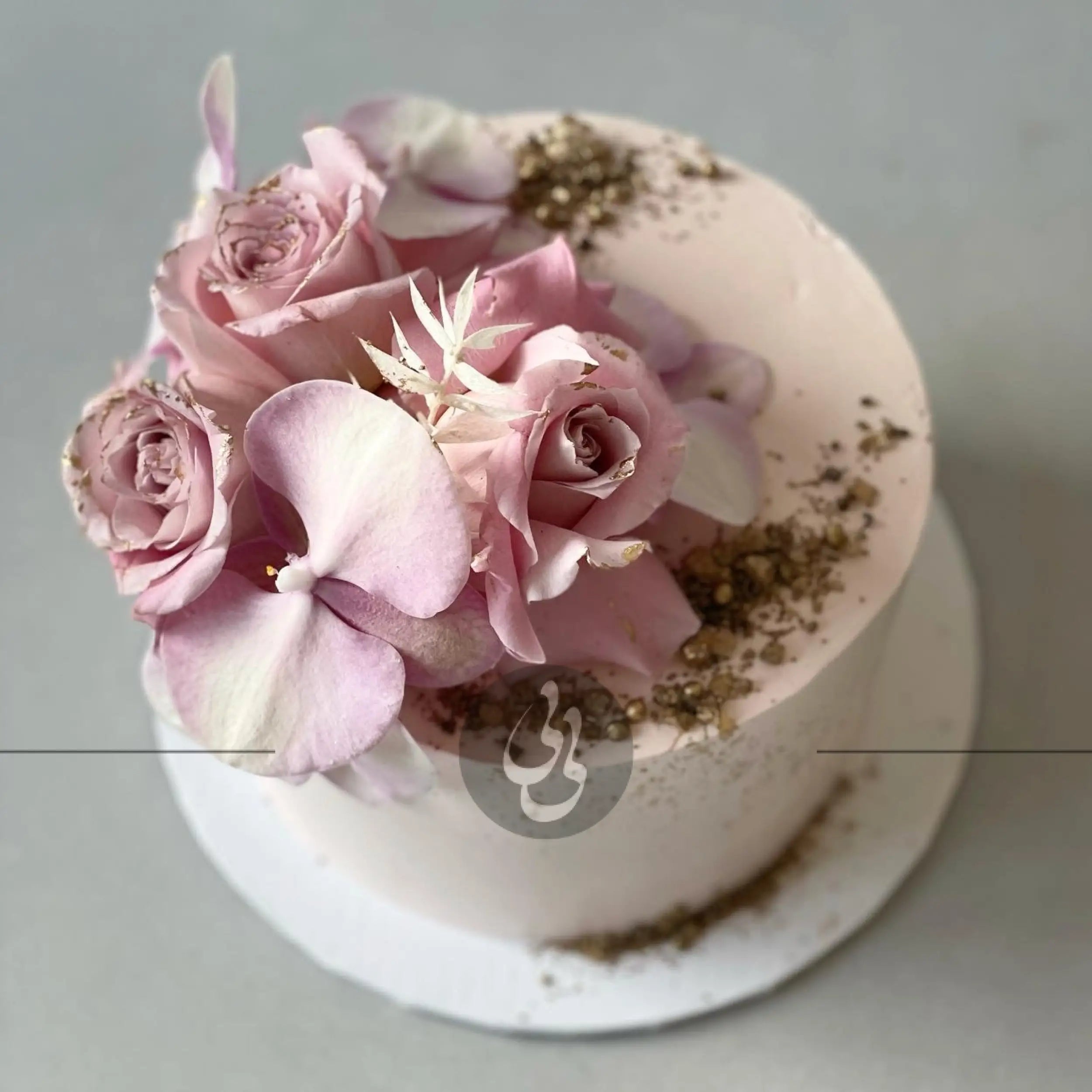 Fresh blooms on whipped cream - custom cake