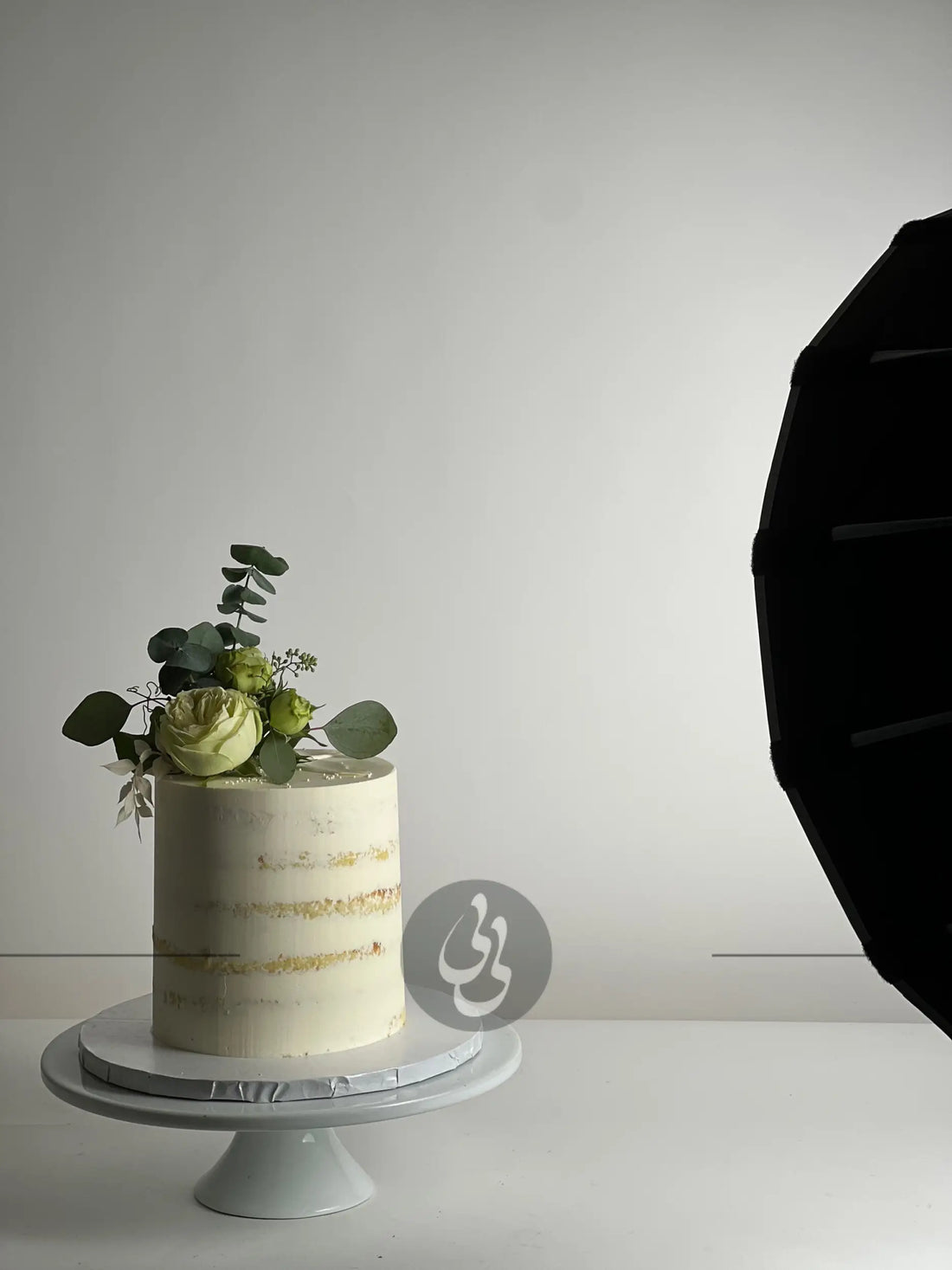 Fresh flowers on semi-naked buttercream - custom cake