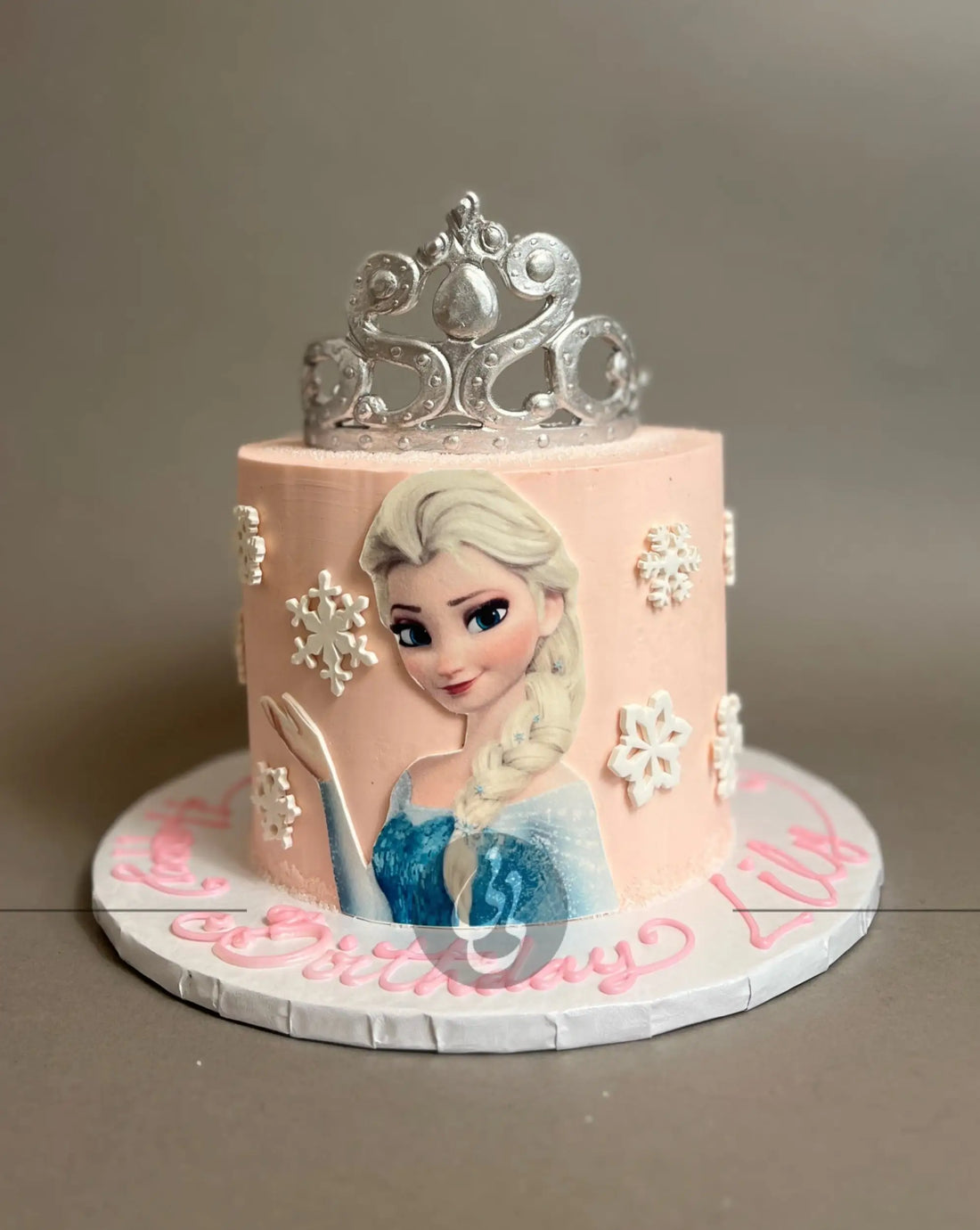 Frozen - elsa’s tiara on buttercream - custom cake