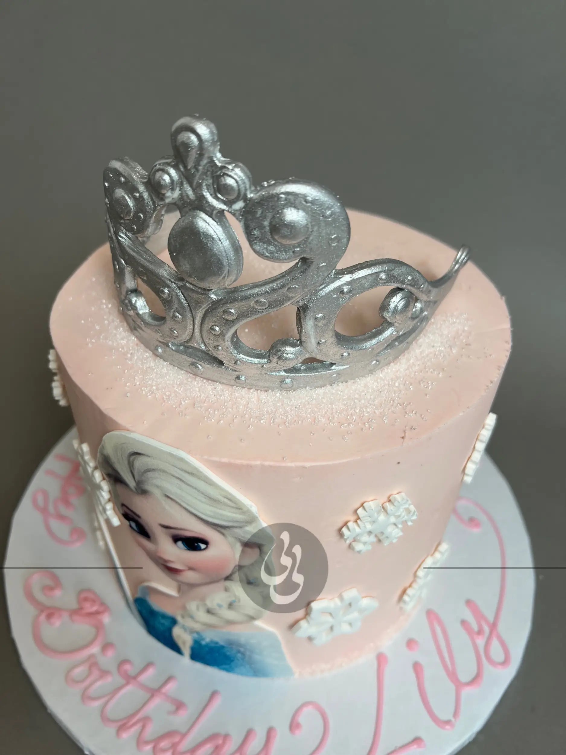 Frozen - elsa’s tiara on buttercream - custom cake