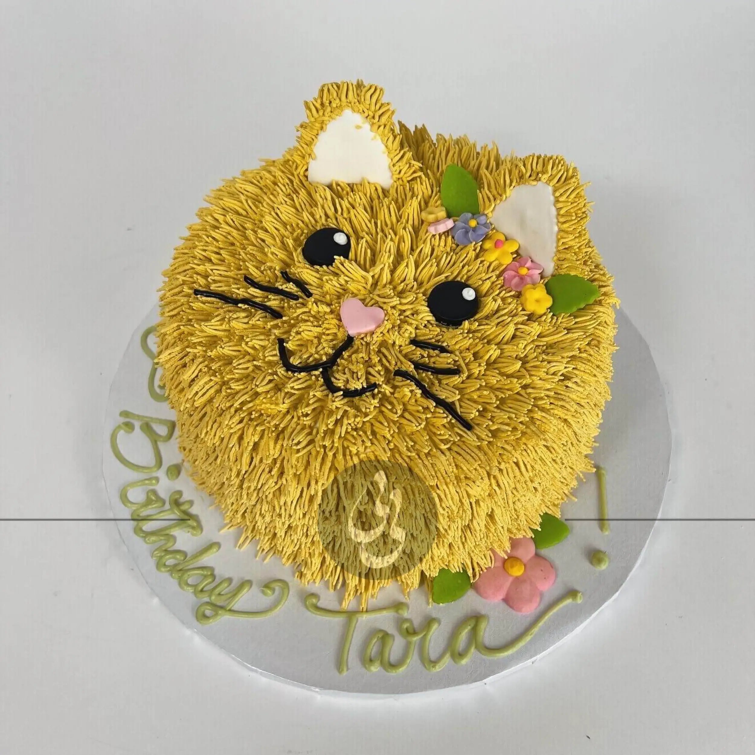 Furry animal friend on whipped cream - custom cake