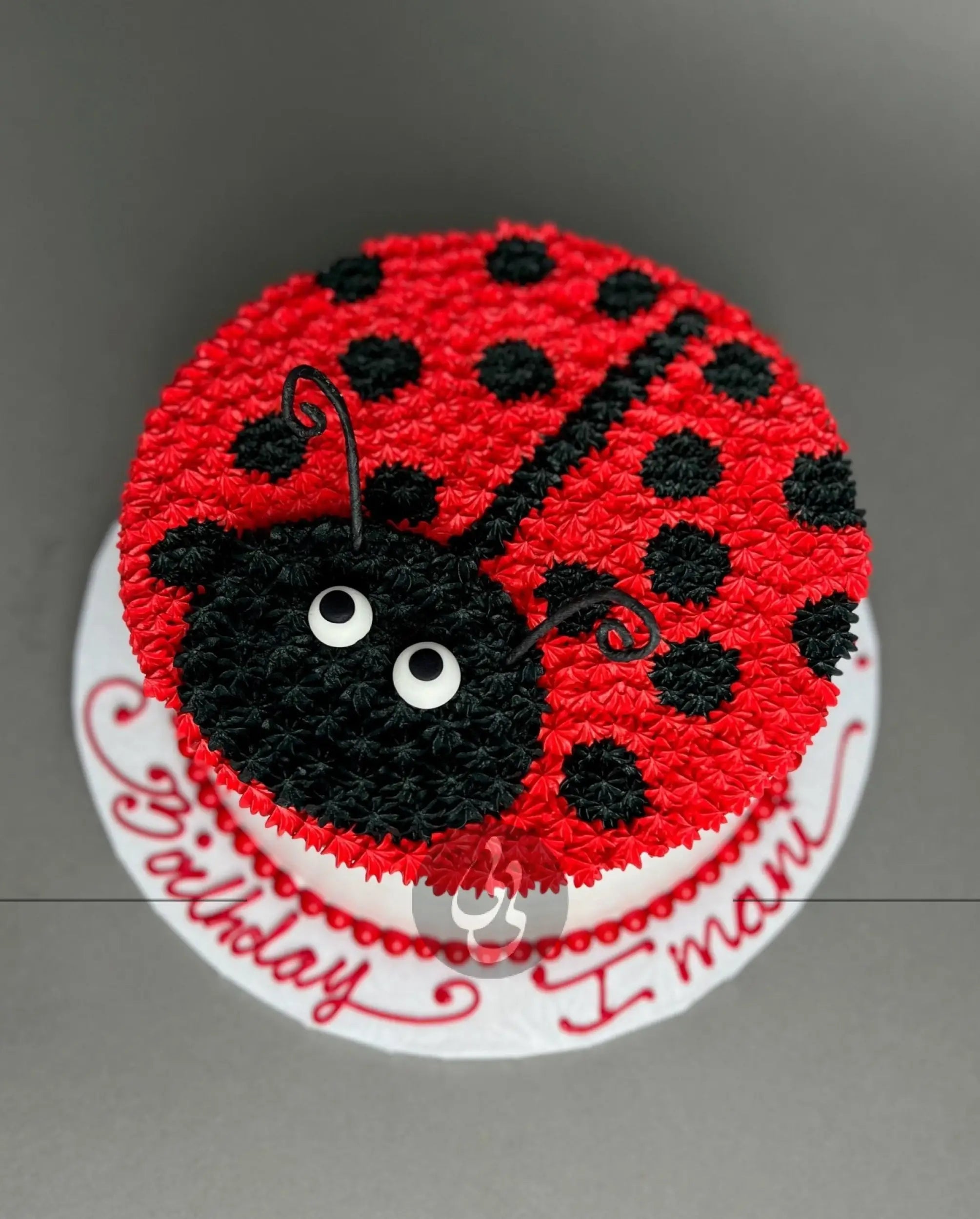 Furry animal friend on whipped cream - custom cake