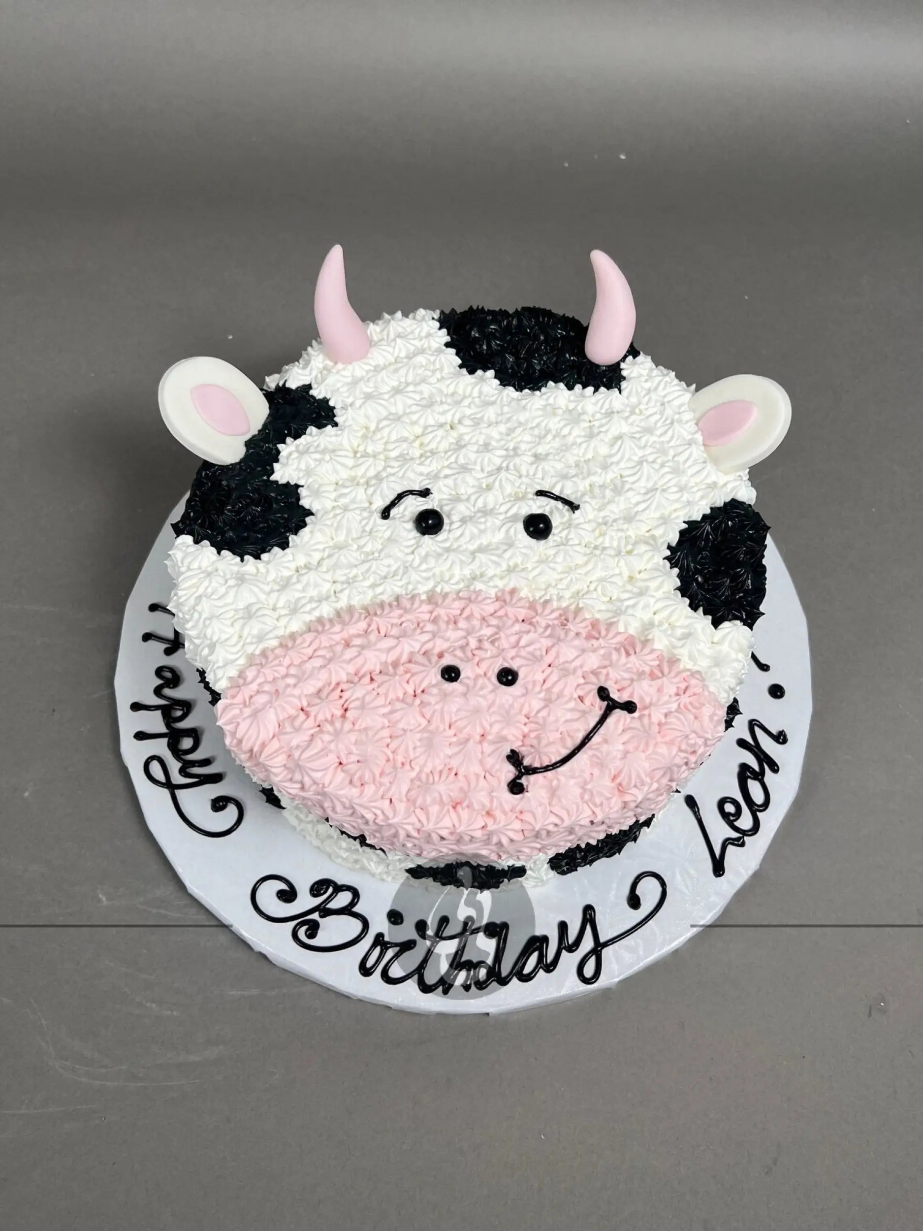 Furry animal friend on whipped cream - custom cake