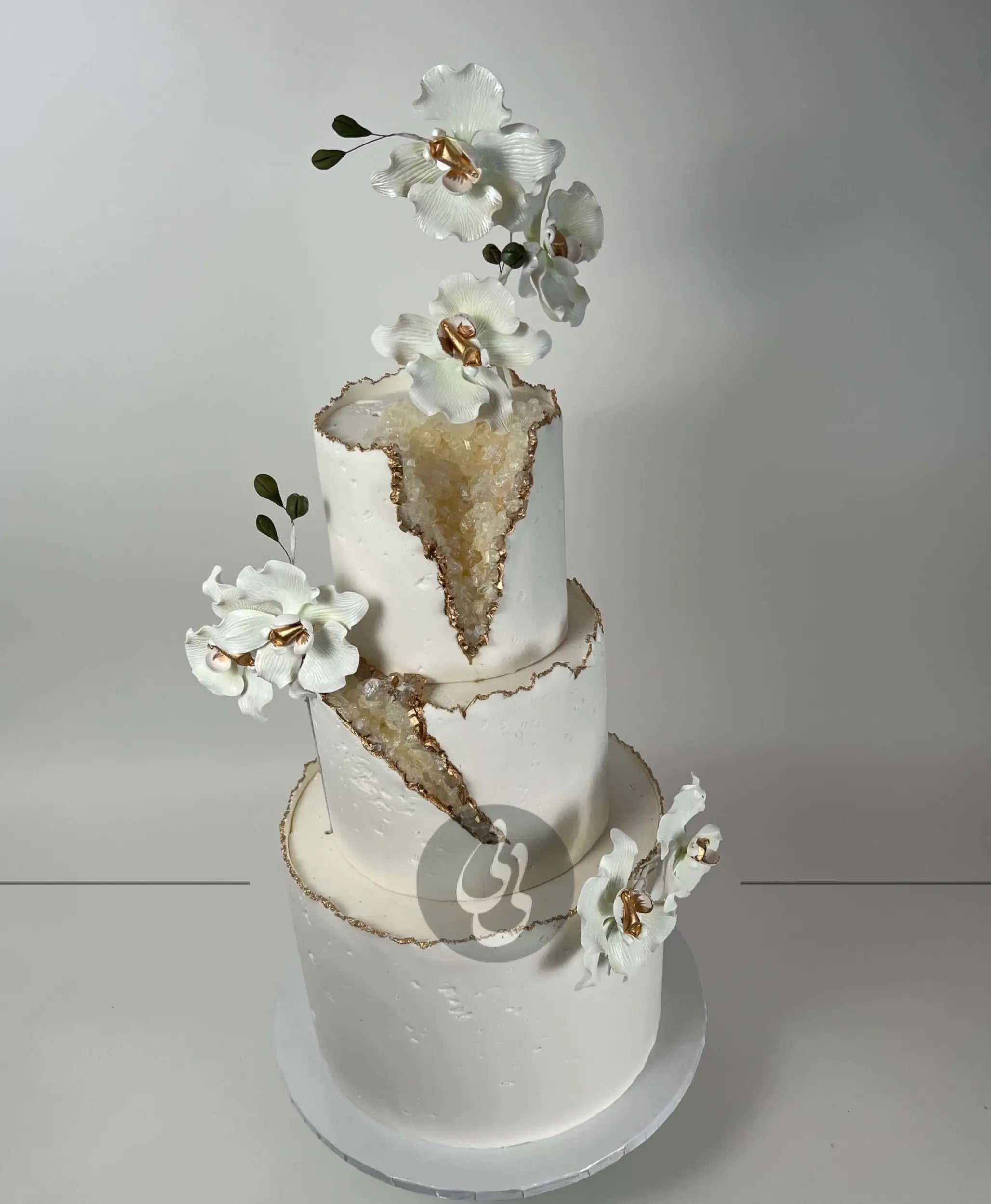 Geode and sugar orchids - wedding cake