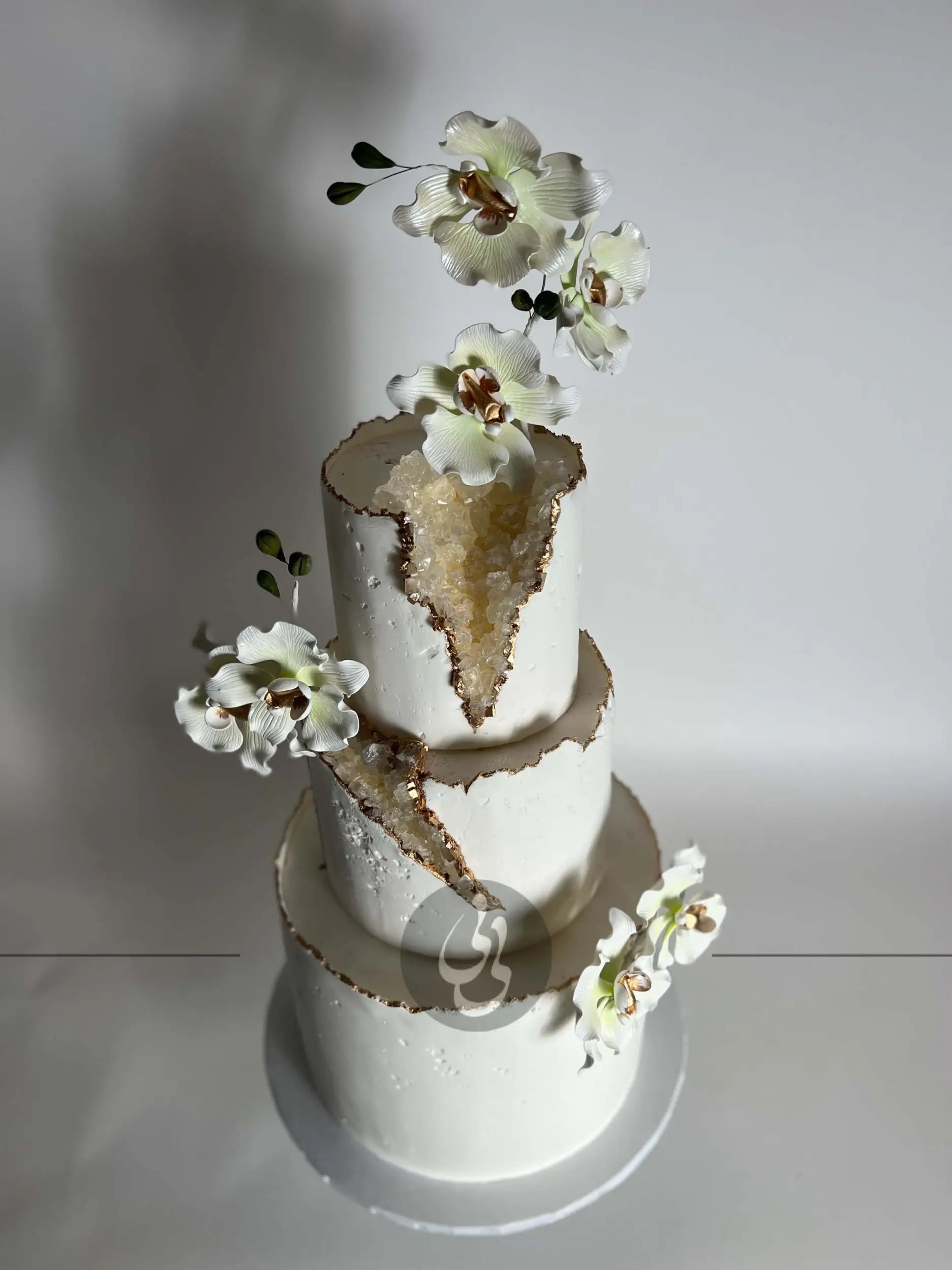 Geode and sugar orchids - wedding cake