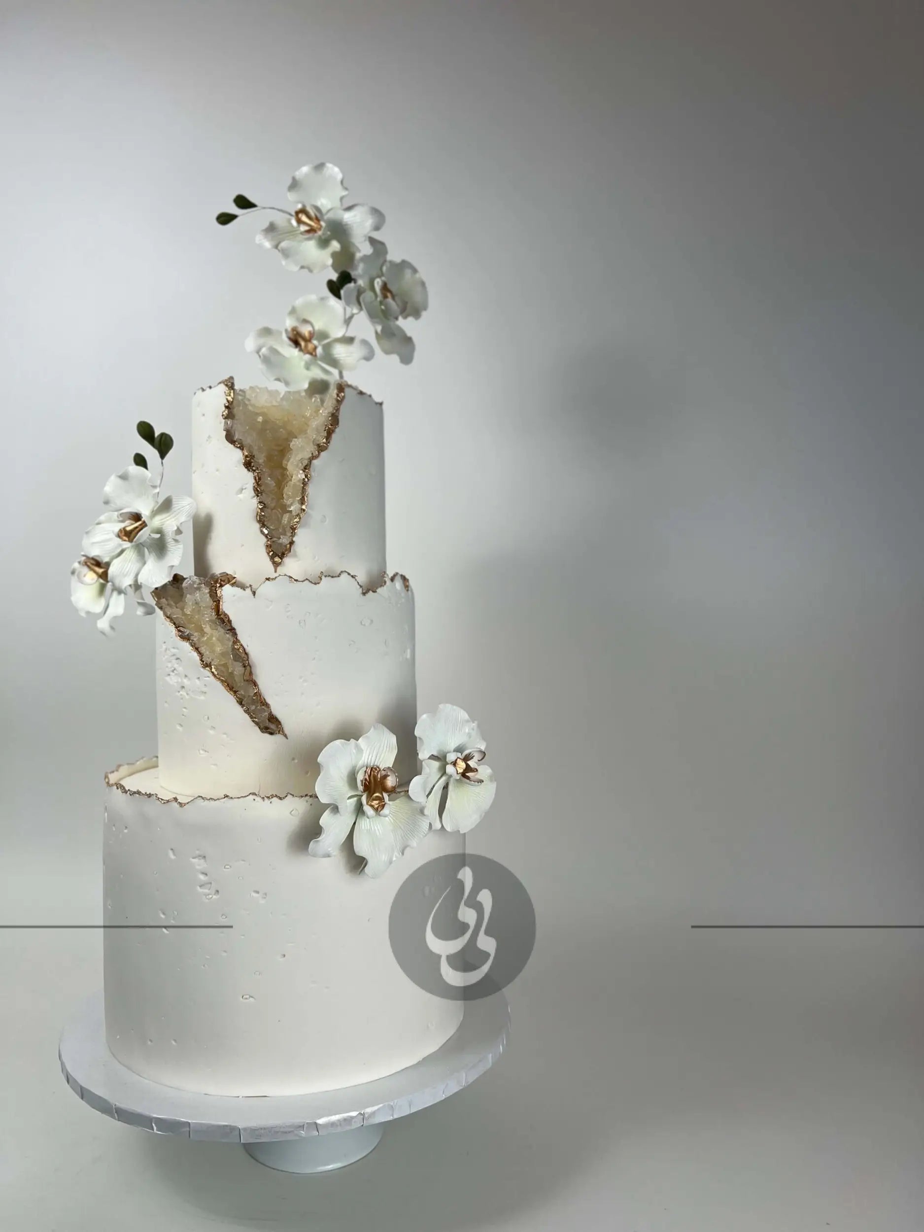 Geode and sugar orchids - wedding cake