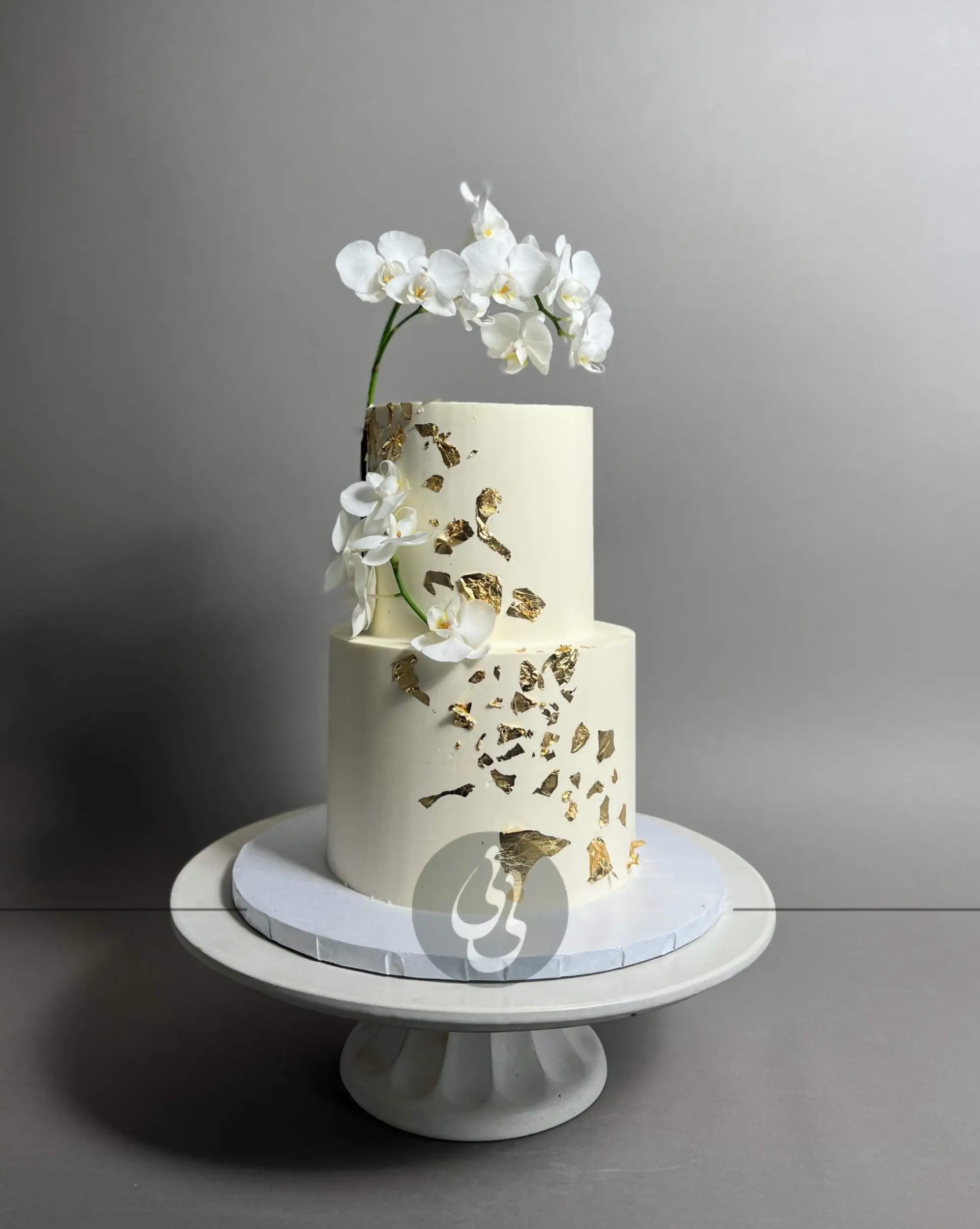 Gold foil fresh orchids - wedding cake