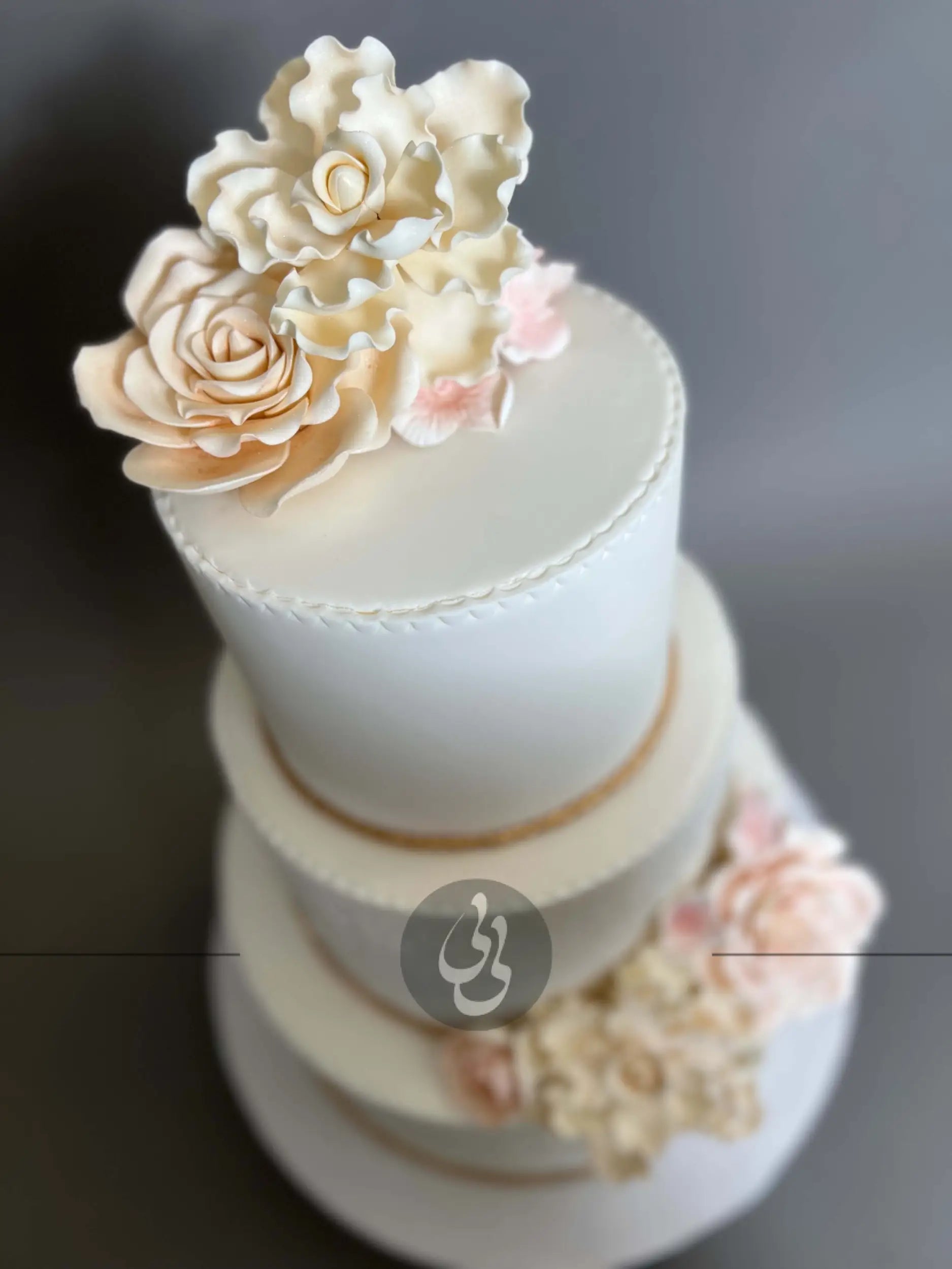 Gold rope and sugar flowers - wedding cake