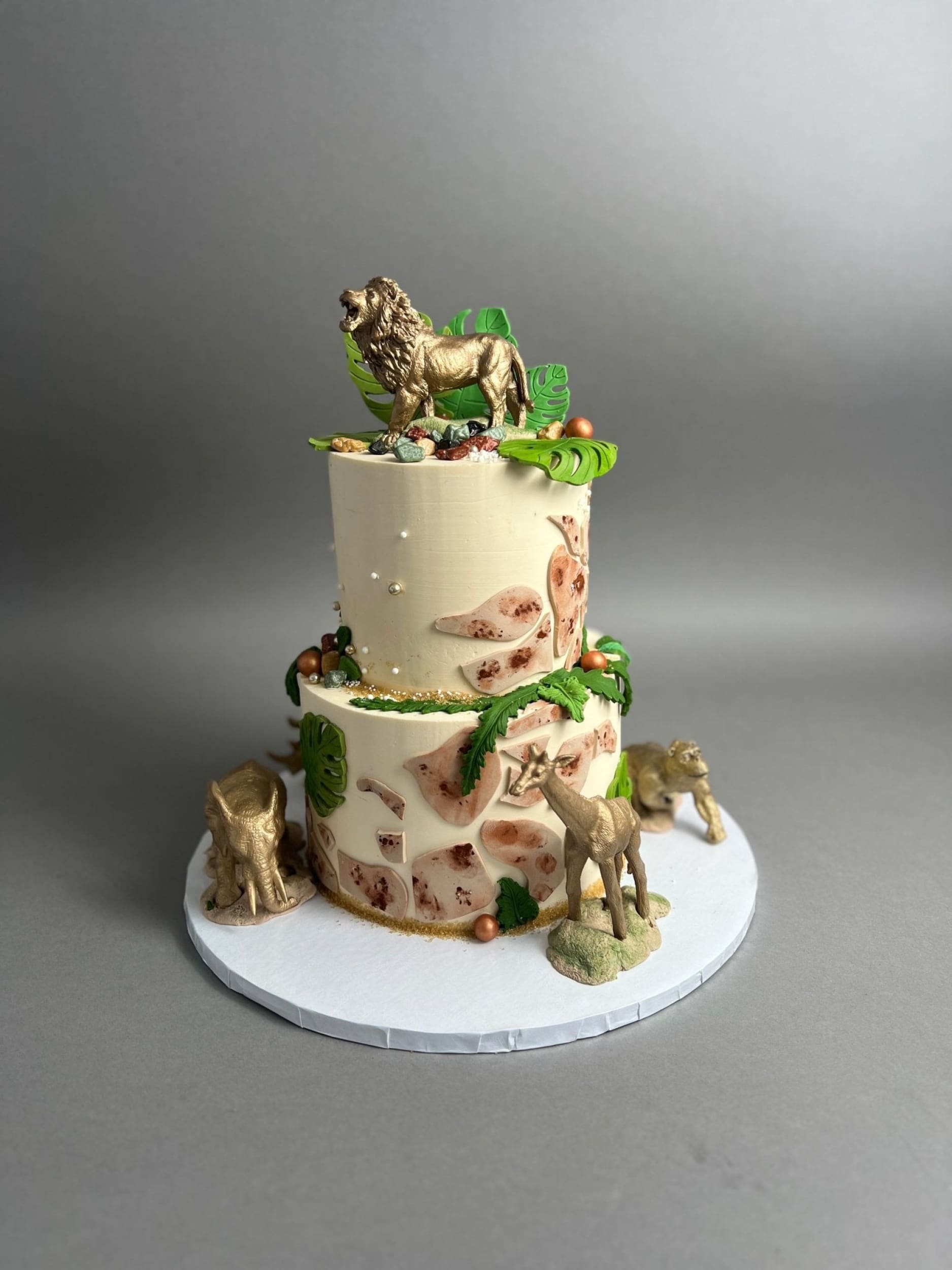 Golden safari animals on buttercream - custom cake