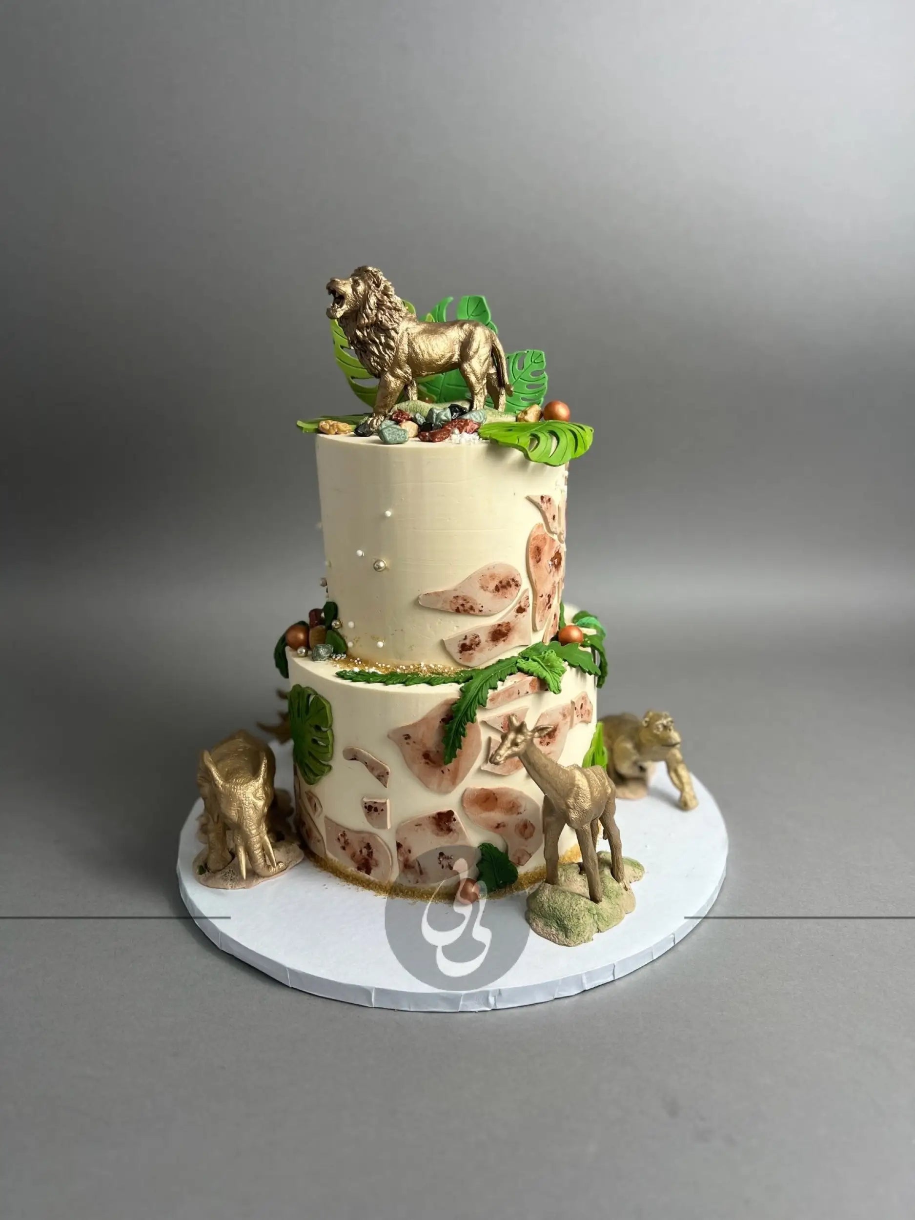 Golden safari animals on buttercream - custom cake